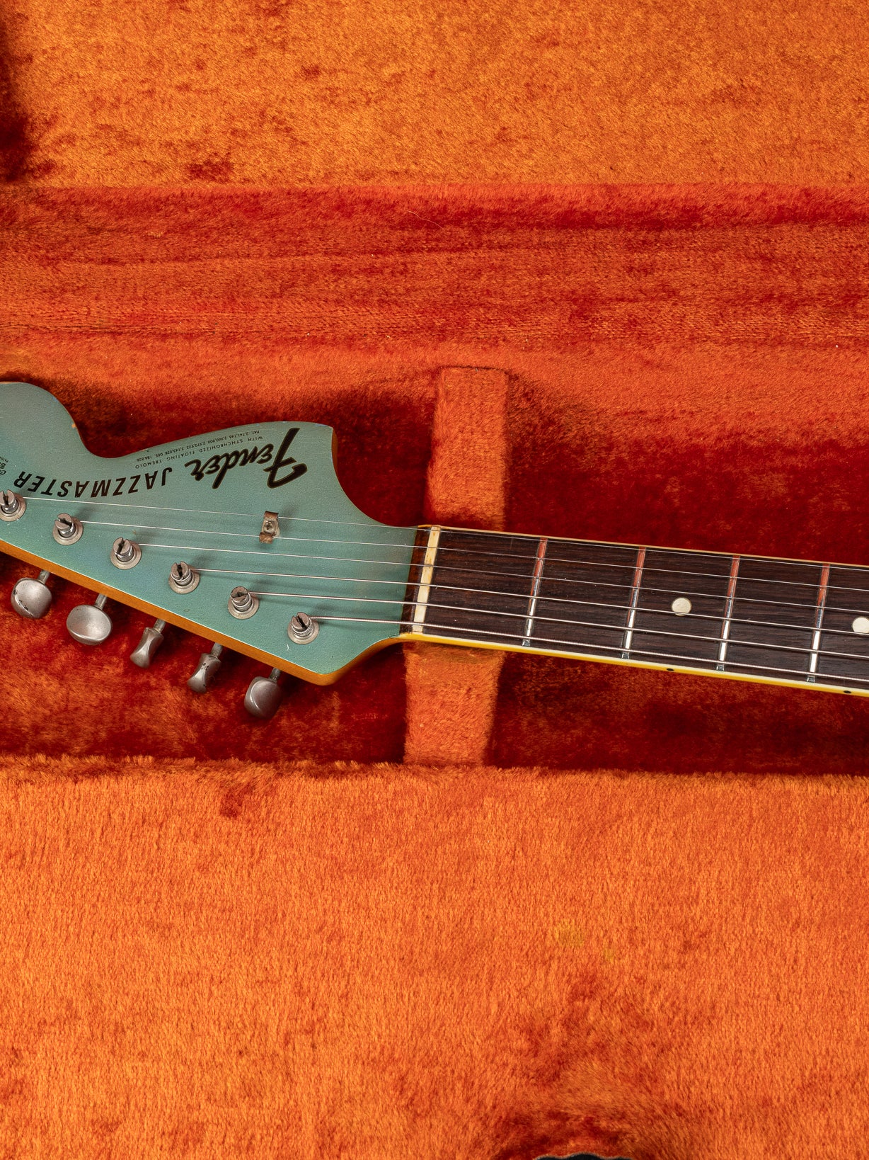 Front of 1966 Fender Jazzmaster Blue Ice Metallic Custom Color Guitar matching headstock in original case