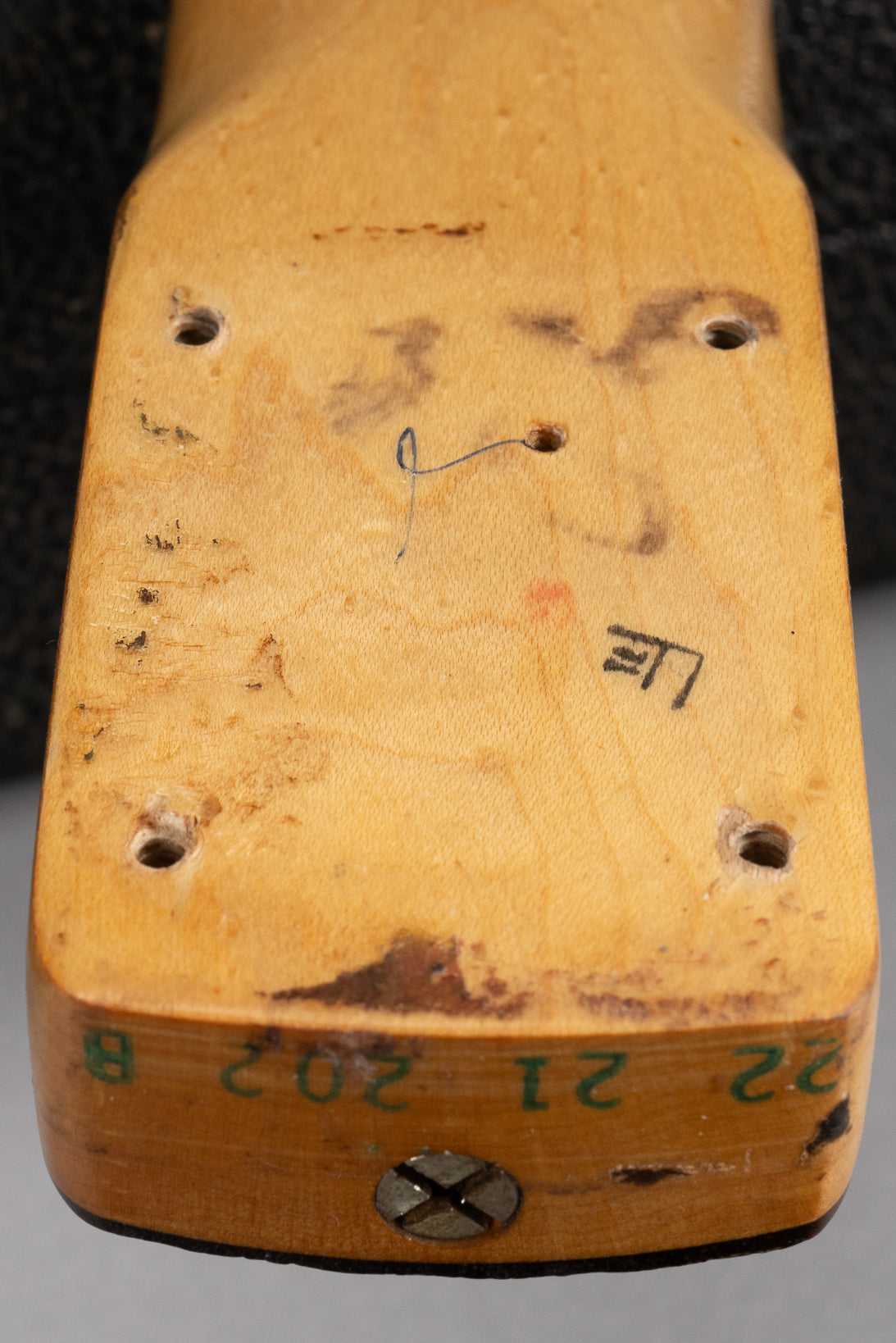 1969 Fender Stratocaster sunburst over white guitar interior neck heel