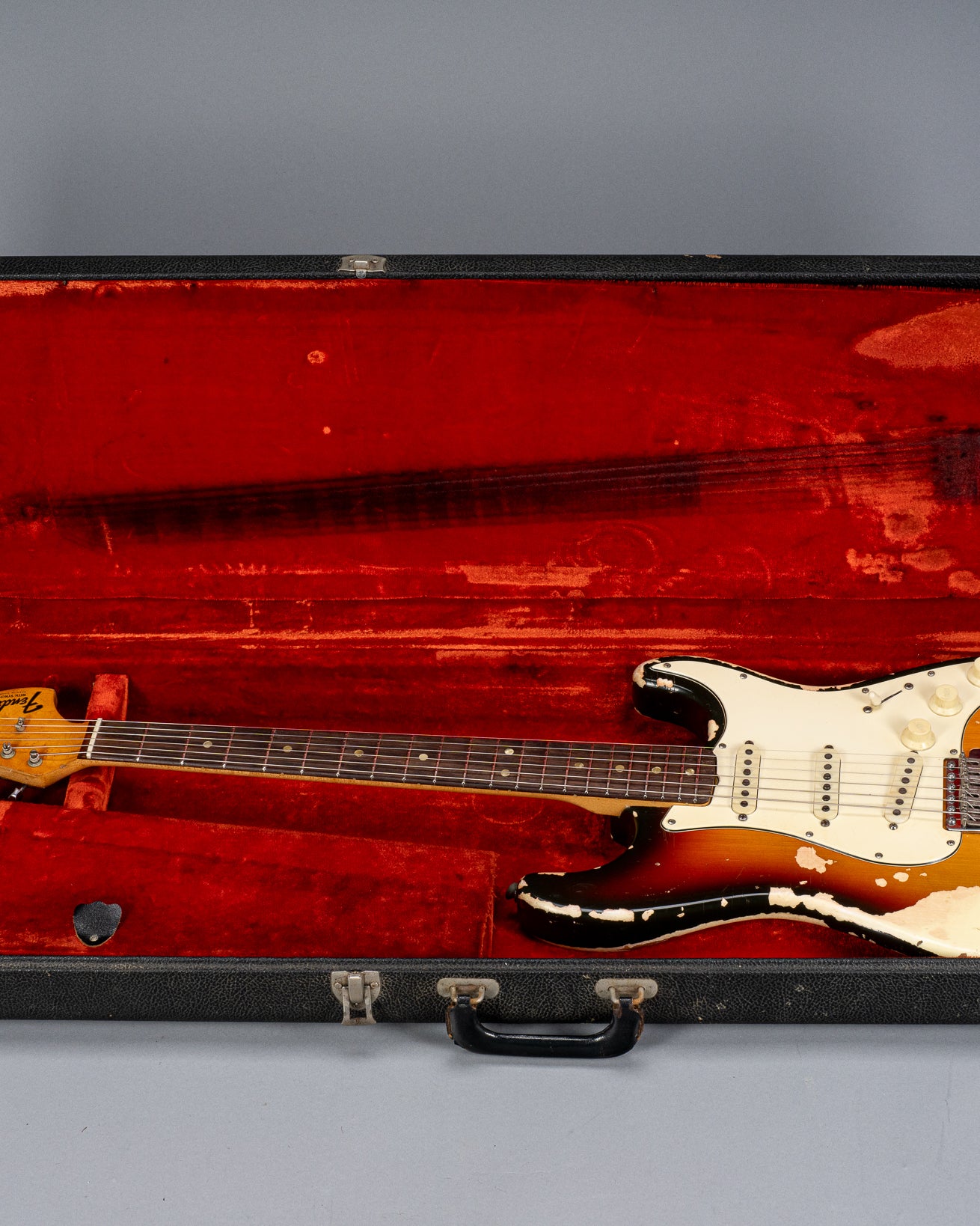 front of 1970 Fender Stratocaster sunburst over white finish distress original pickups bridge  neck and fret board original case