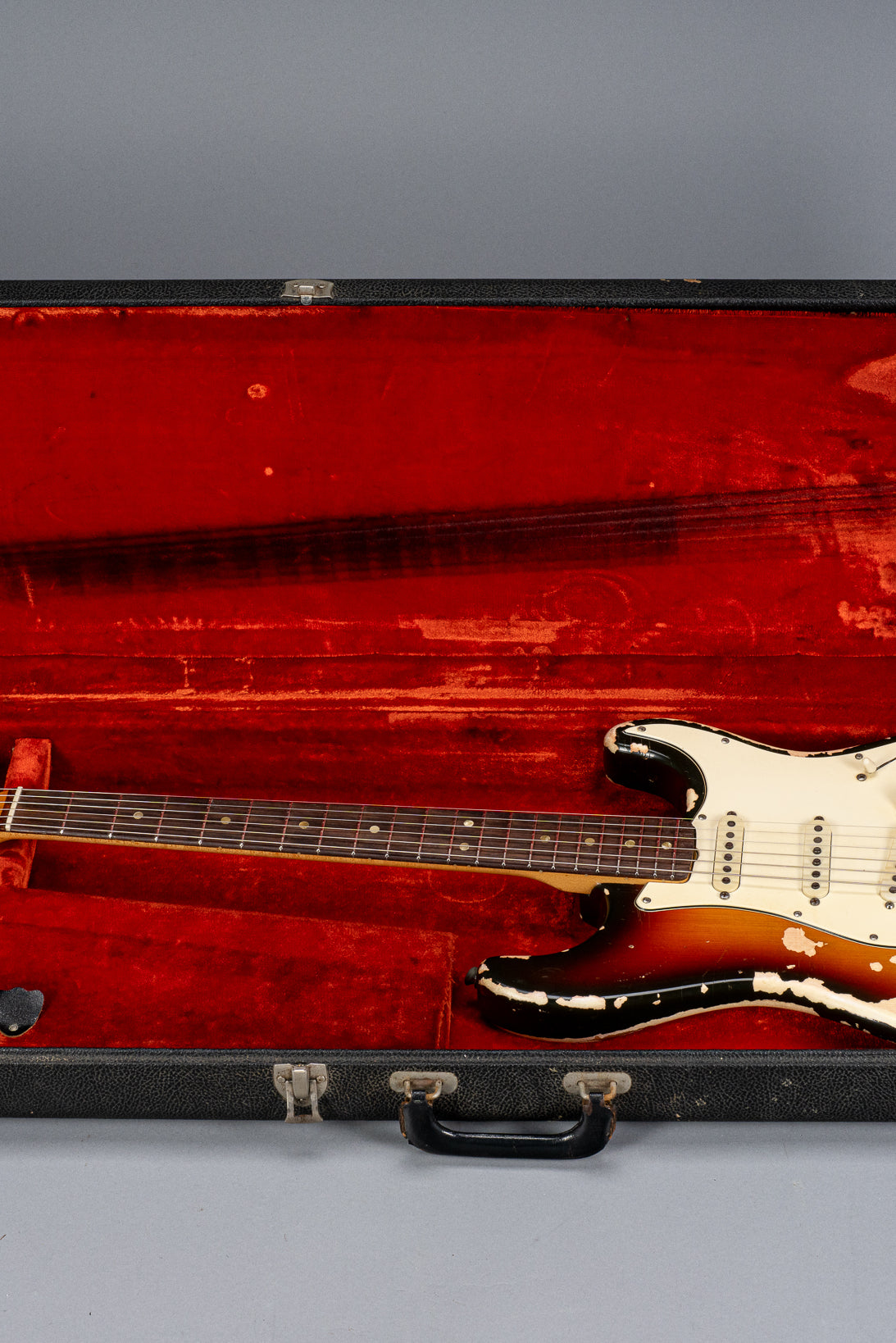 front of 1970 Fender Stratocaster sunburst over white finish distress original pickups bridge  neck and fret board original case