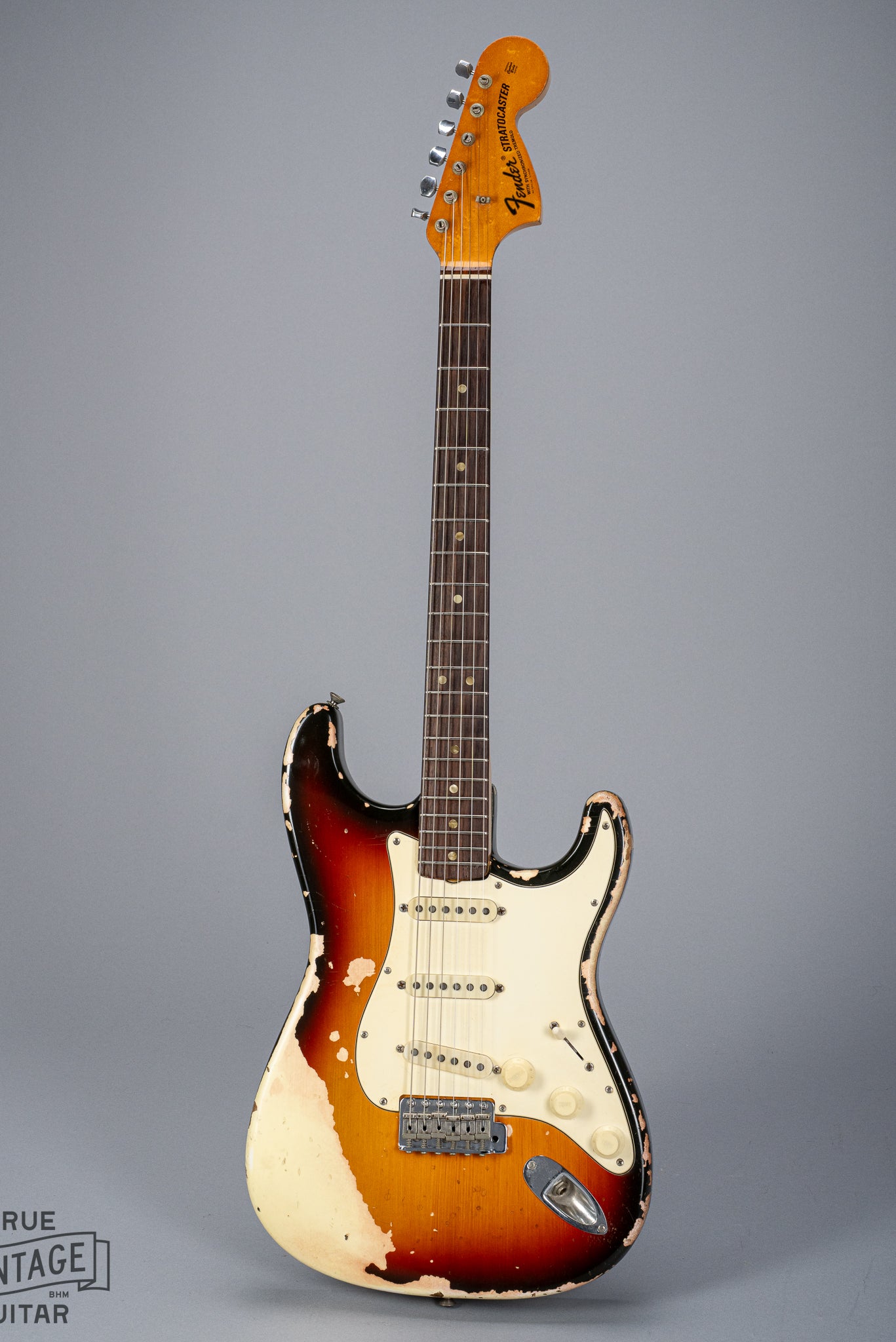 full front of 1970 Fender Stratocaster sunburst over white finish distress original pickups bridge neck and headstock