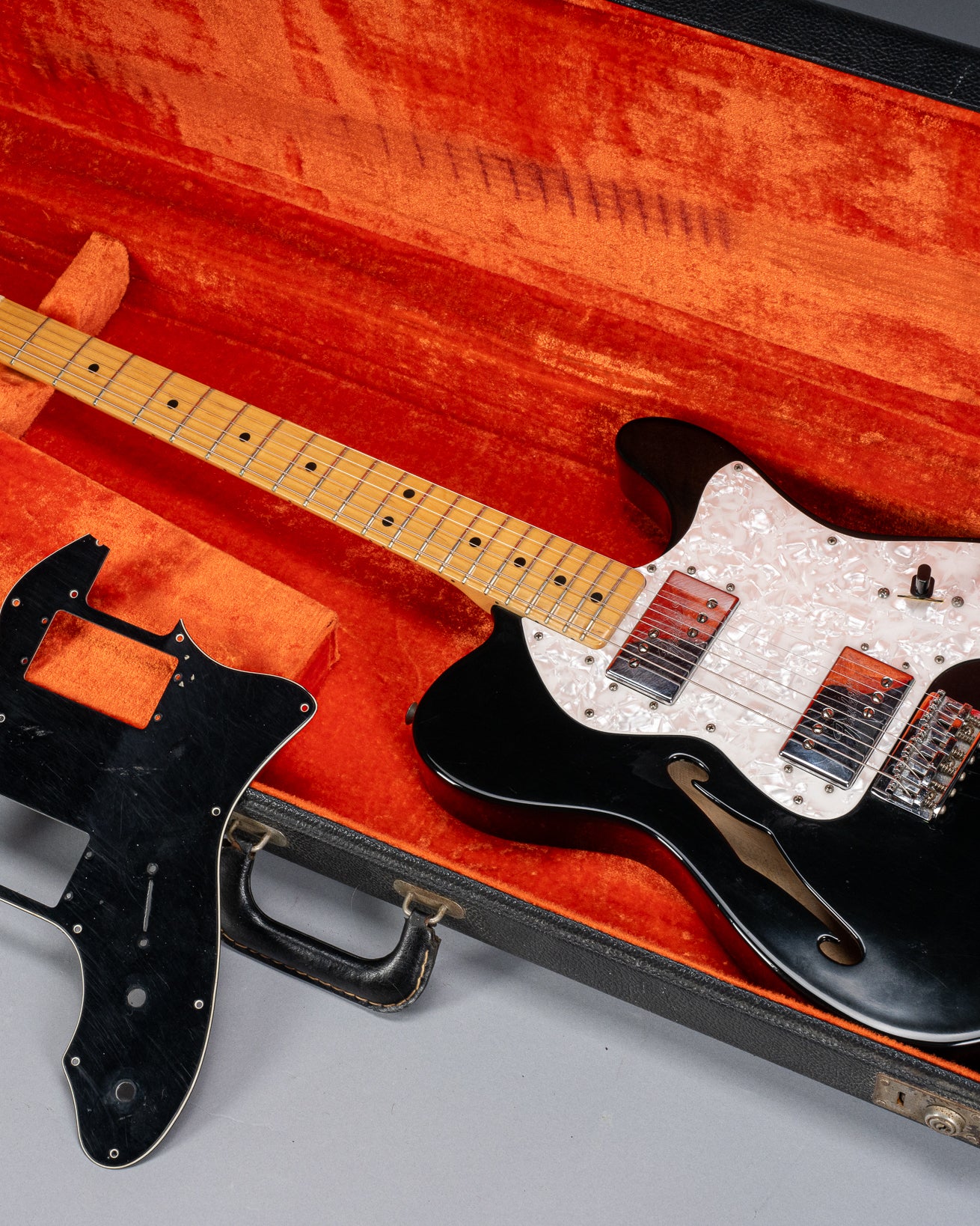 front of 1978 Fender Telecaster Thinline Black guitar body semi hollow humbuckers sparkle guard and original pickguard neck and fretboard original case