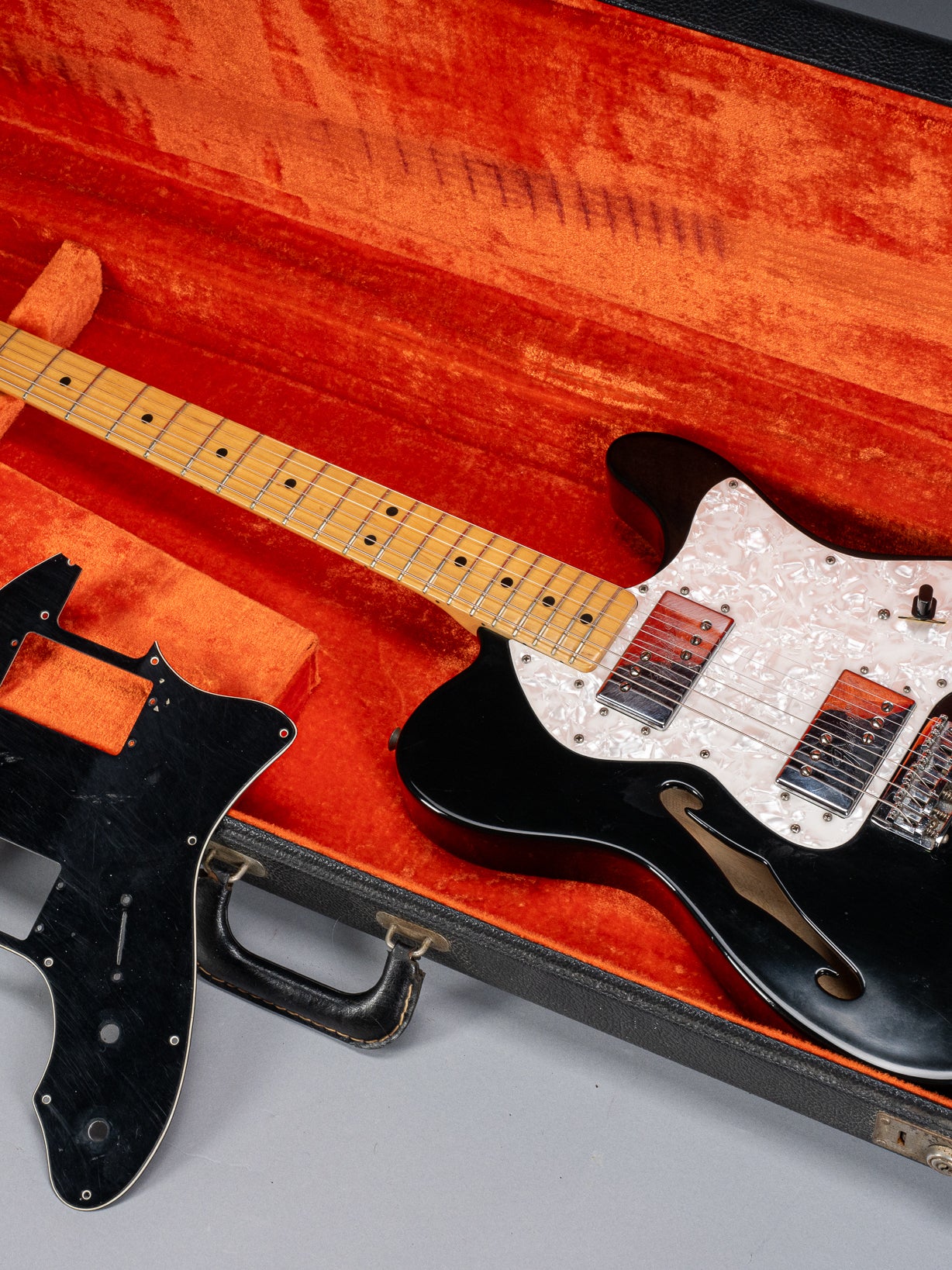front of 1978 Fender Telecaster Thinline Black guitar body semi hollow humbuckers sparkle guard and original pickguard neck and fretboard original case