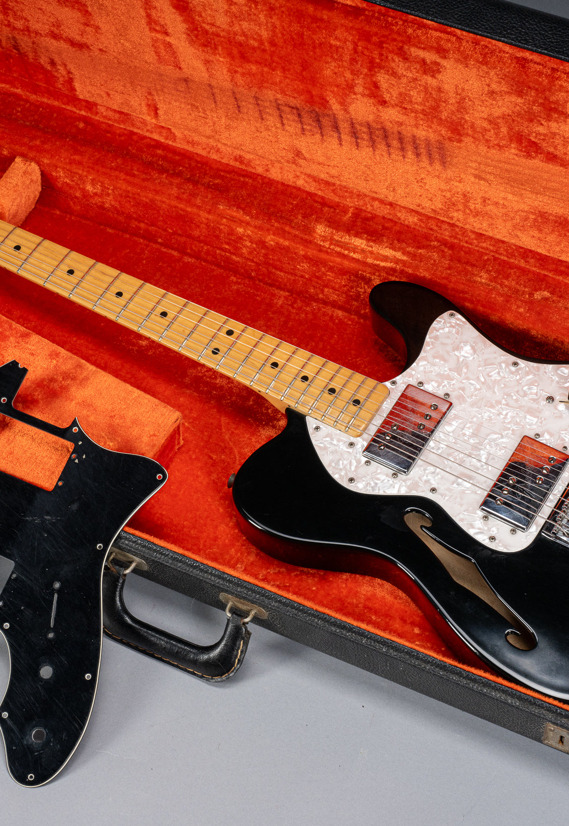 front of 1978 Fender Telecaster Thinline Black guitar body semi hollow humbuckers sparkle guard and original pickguard neck and fretboard original case