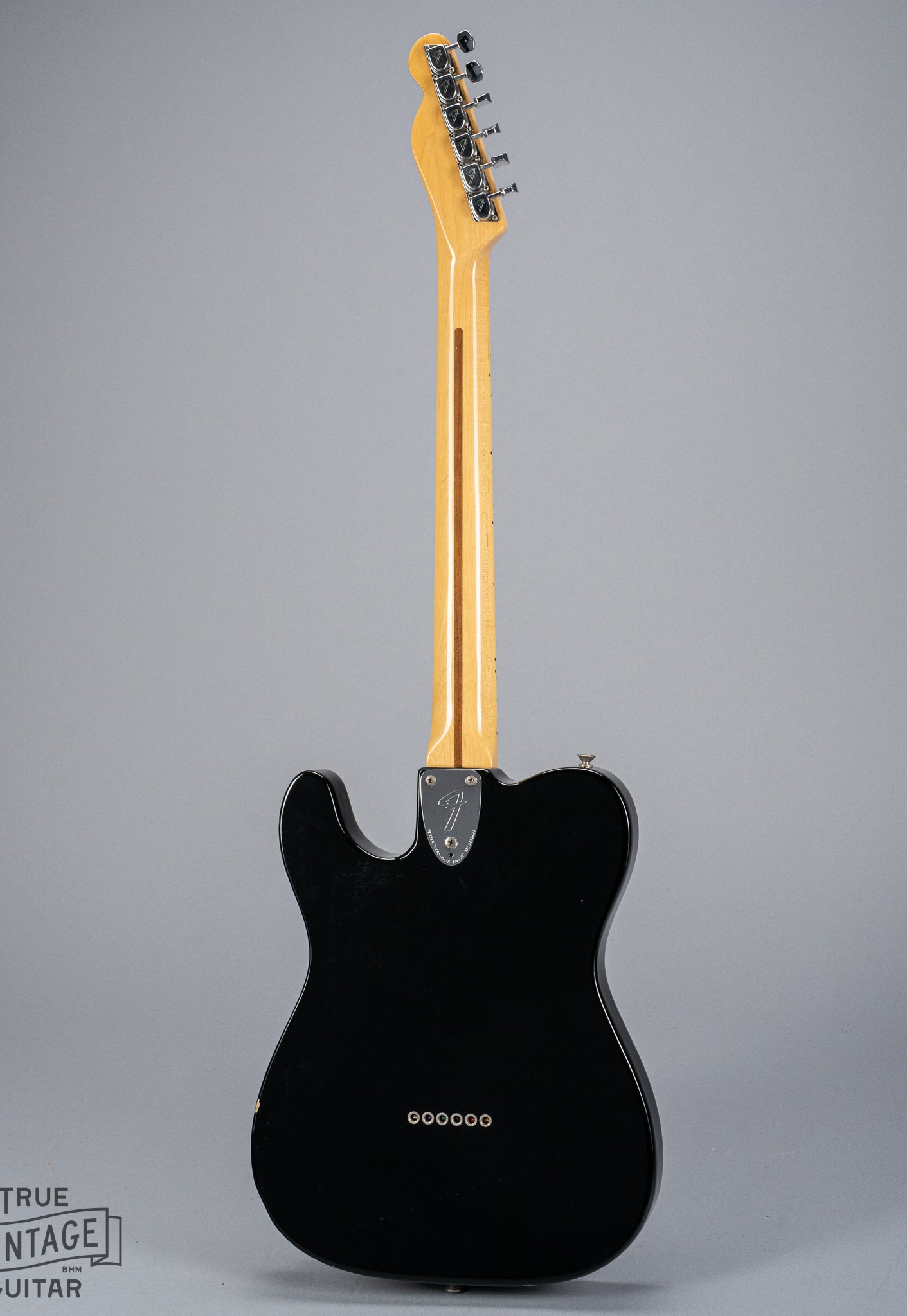 back of 1978 Fender Telecaster Thinline Black guitar body semi hollow 3 bolt neck and headstock tuners
