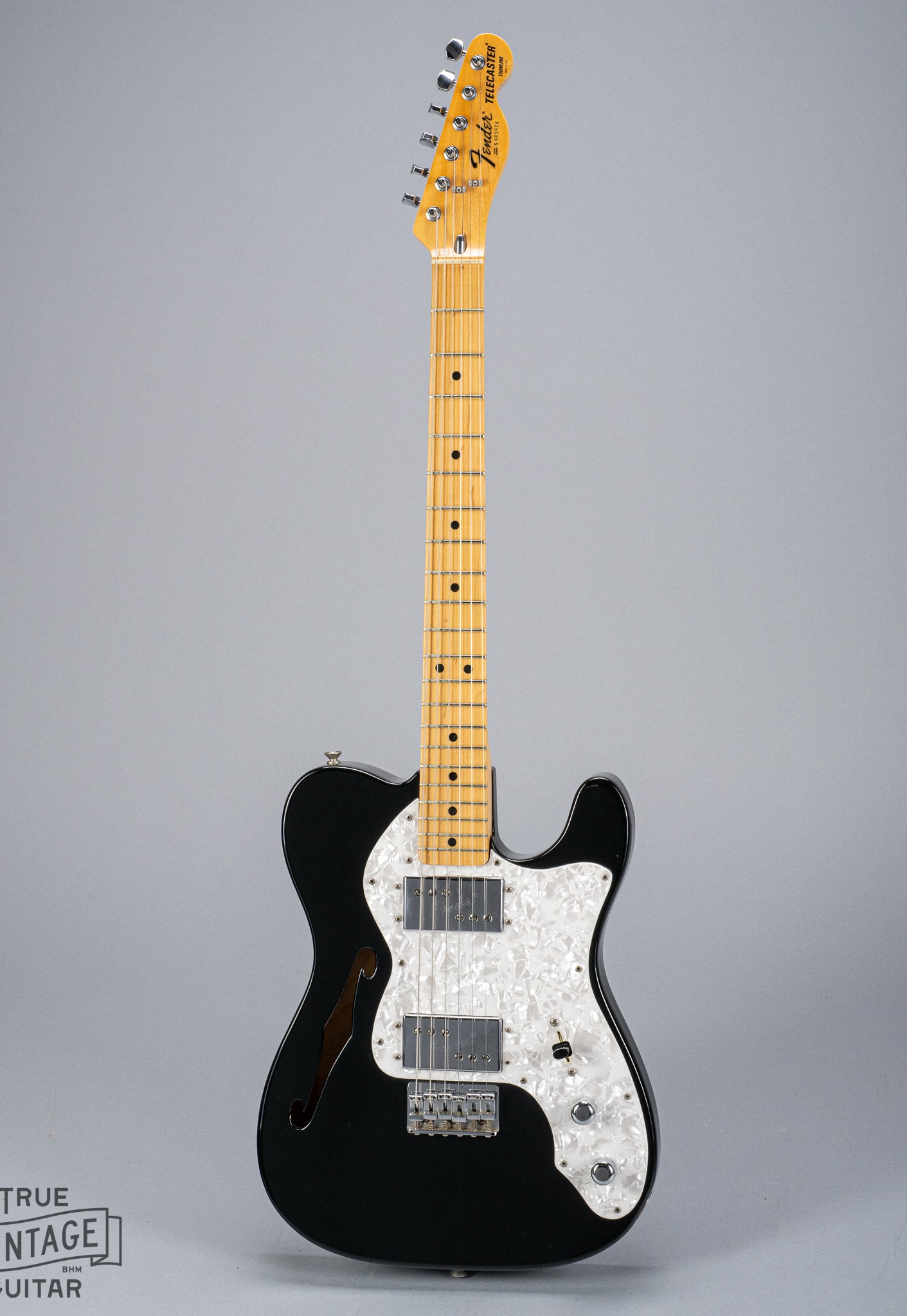 front of 1978 Fender Telecaster Thinline Black guitar body semi hollow humbuckers sparkle guard fretboard and headstock