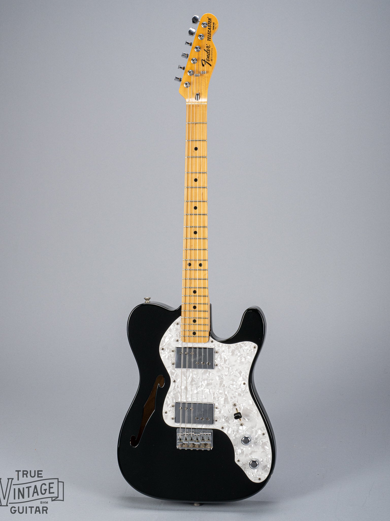 front of 1978 Fender Telecaster Thinline Black guitar body semi hollow humbuckers sparkle guard fretboard and headstock