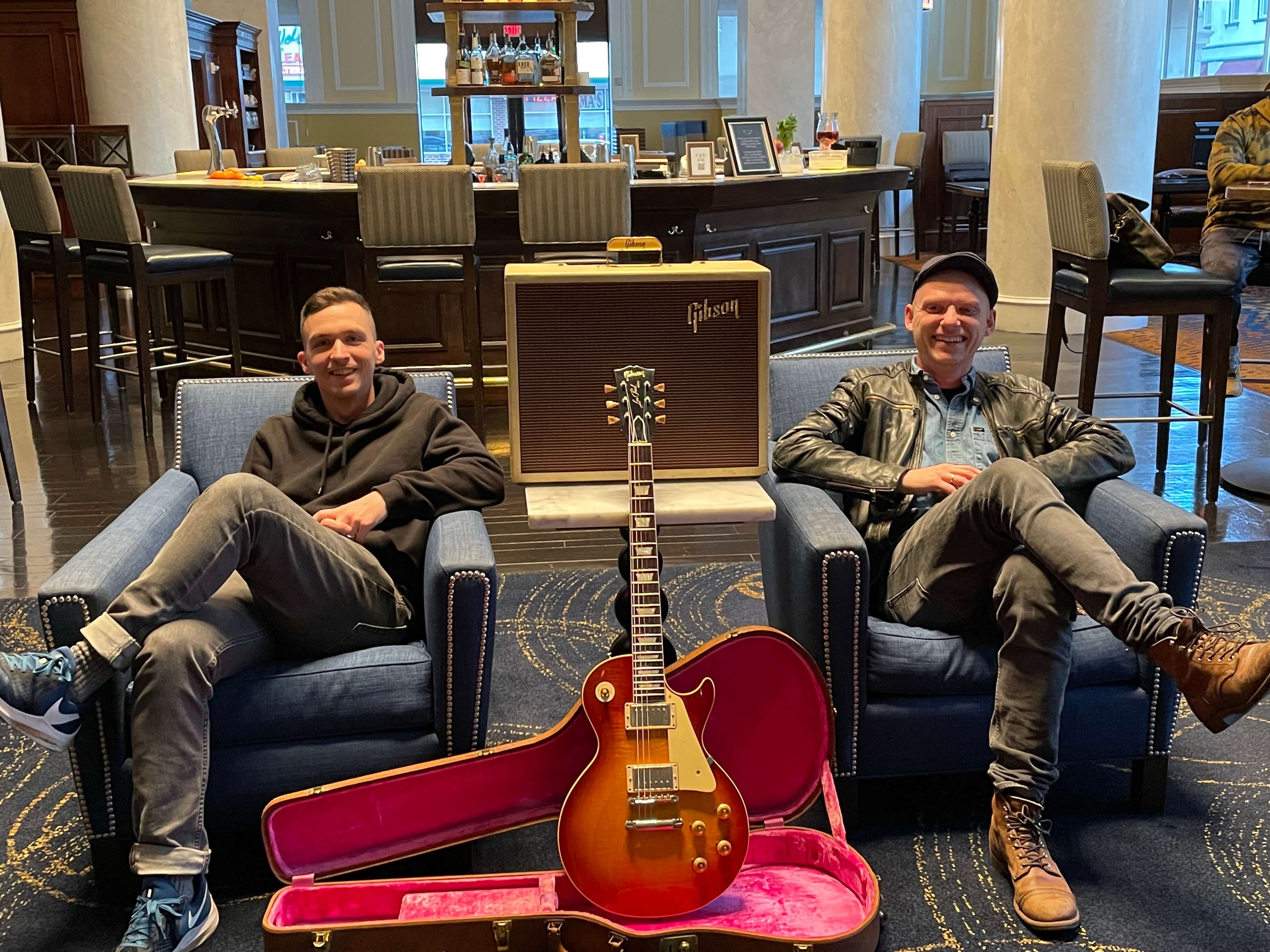 This image shows John Shults of True Vintage Guitar helping someone sell a vintage guitar. True Vintage Guitar is a place that you can sell vintage Gibson and Fender guitars to a passionate buyer.