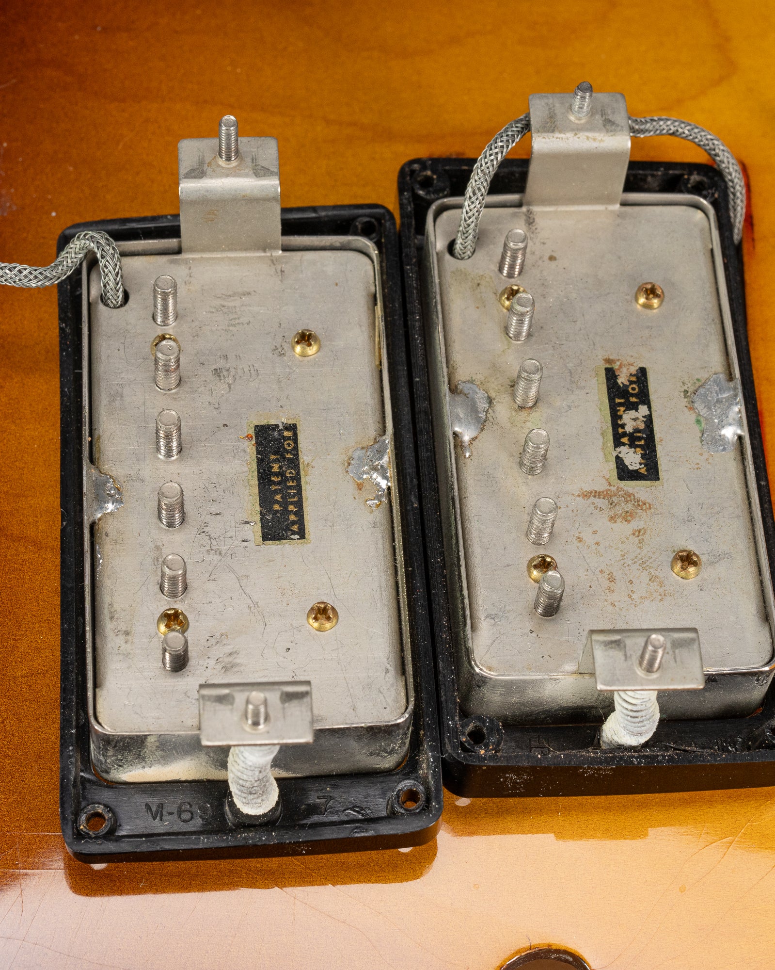 PAF patent applied for humbucking pickups inside of a 1959 Gibson ES-335. The black plastic rings are marked "M-69".