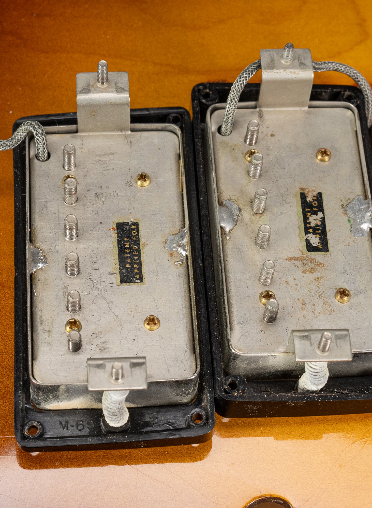 PAF patent applied for humbucking pickups inside of a 1959 Gibson ES-335. The black plastic rings are marked "M-69".