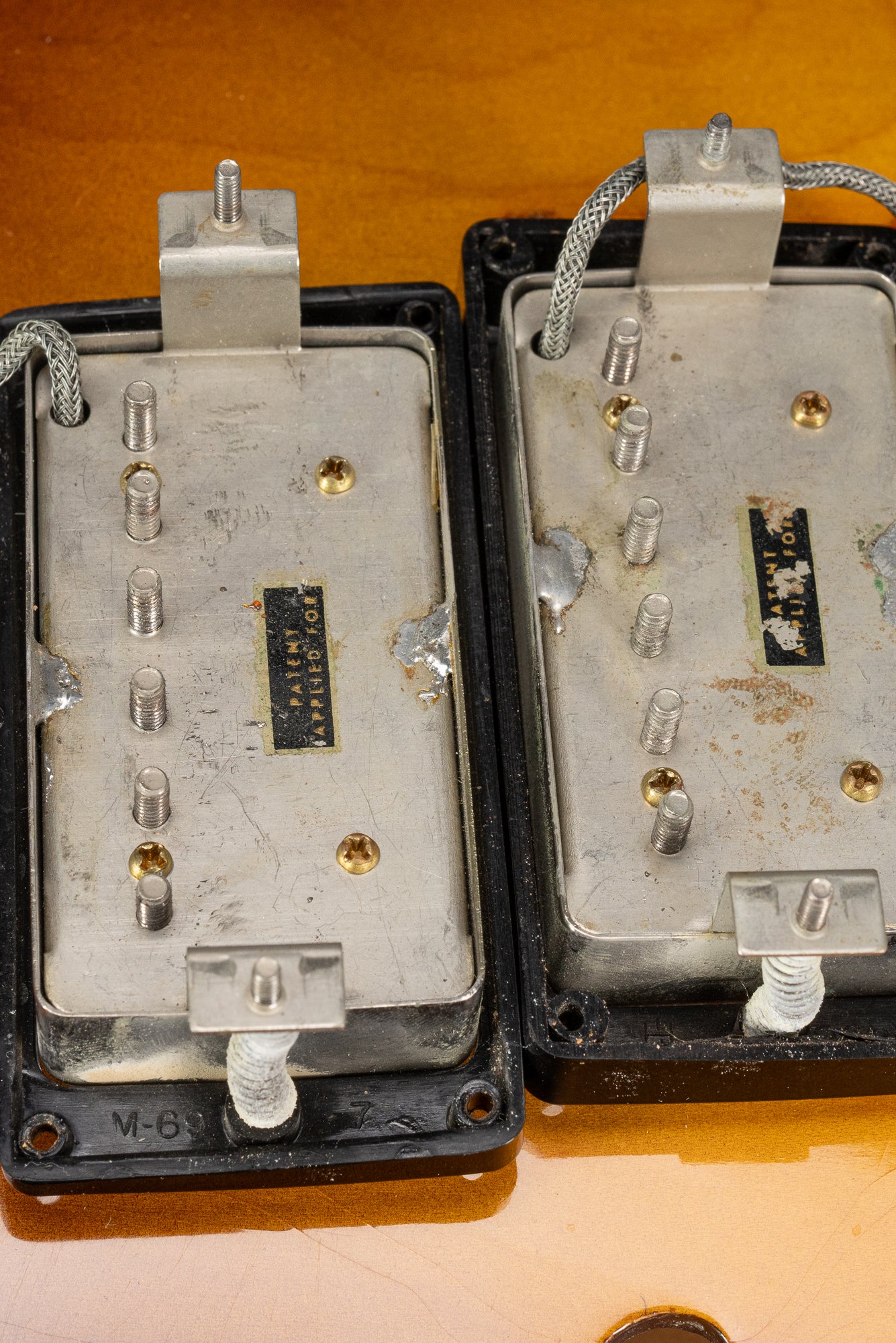 PAF patent applied for humbucking pickups inside of a 1959 Gibson ES-335. The black plastic rings are marked "M-69".