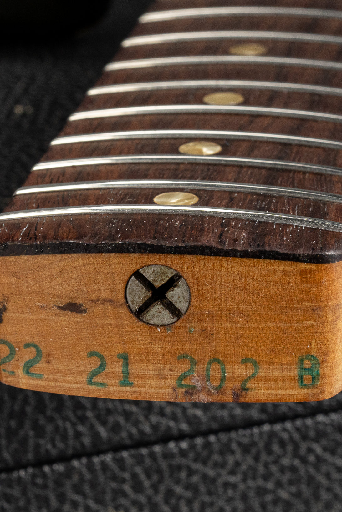 1970 Fender Stratocaster sunburst over white guitar interior neck heel