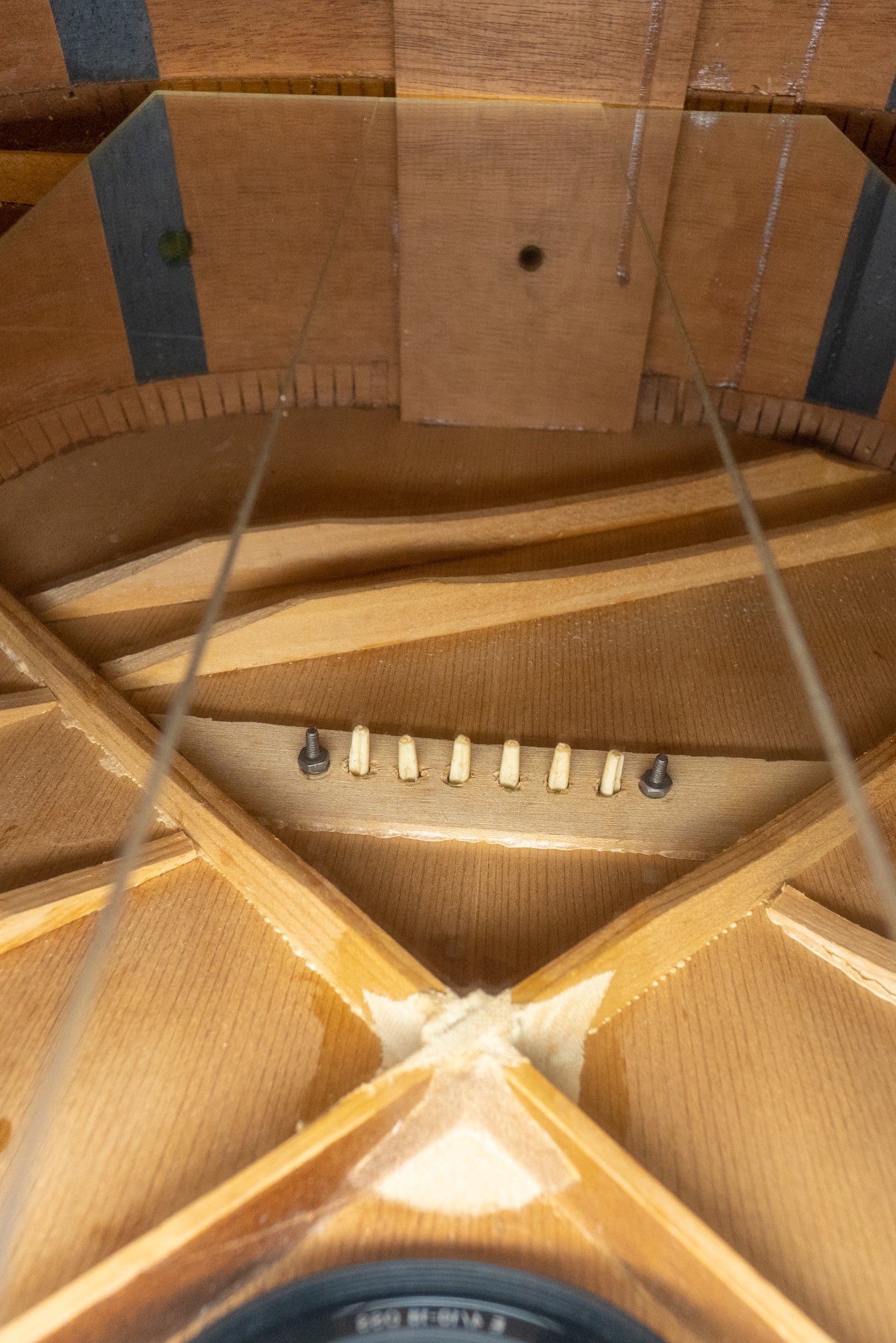 Top bracing, bridge plate, solid rims with cloth side supports