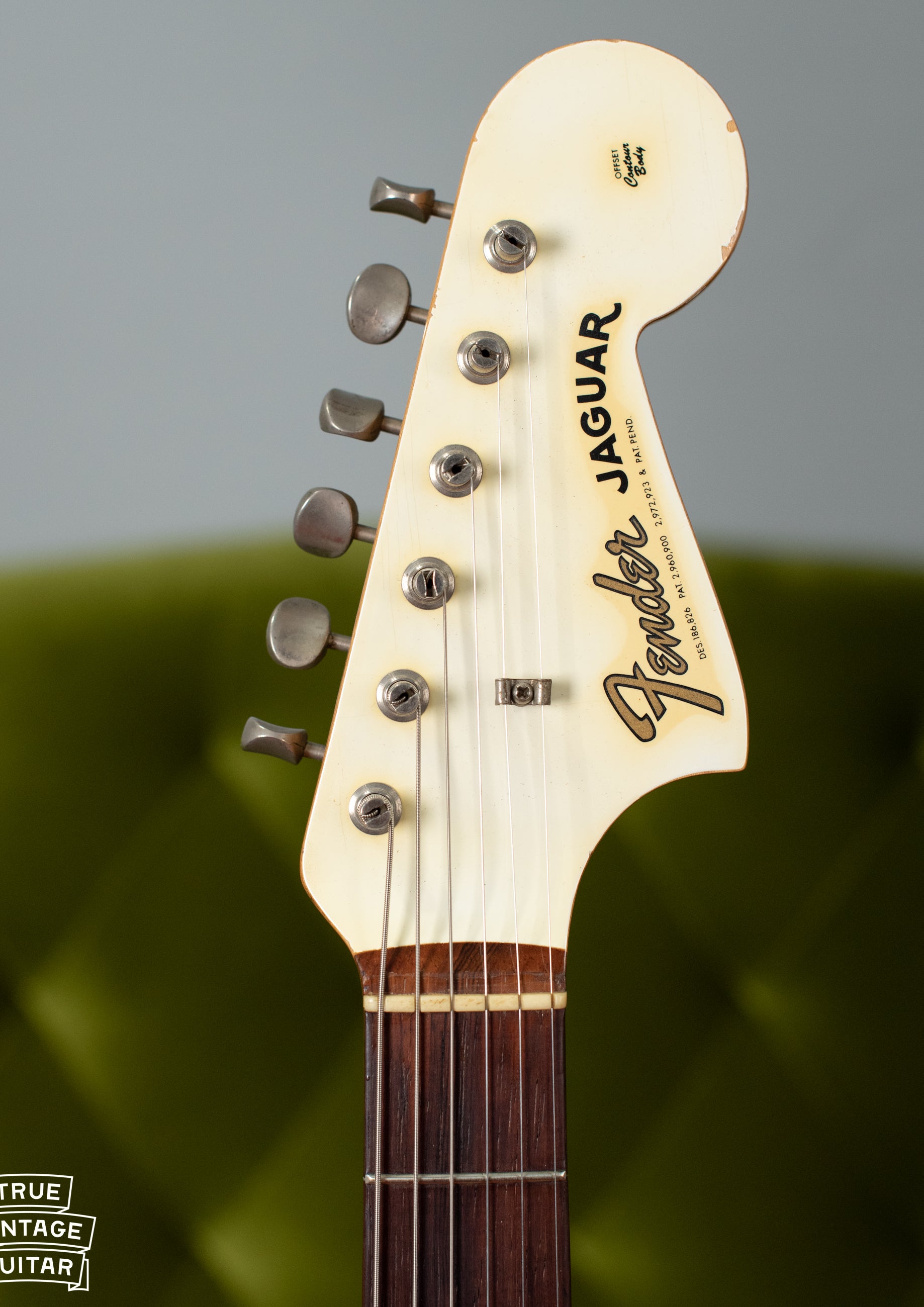 matching headstock, slab fretboard