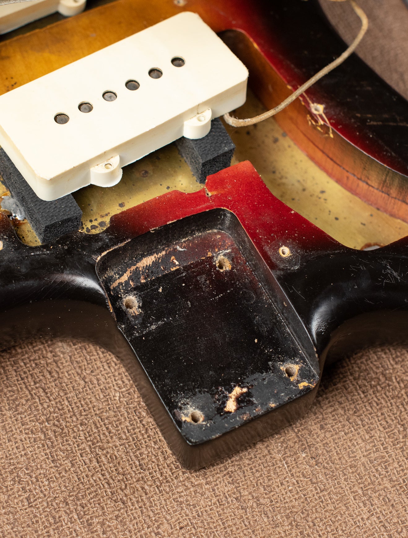 Neck pocket, nail hole, vintage 1963 Fender Jazzmaster electric guitar