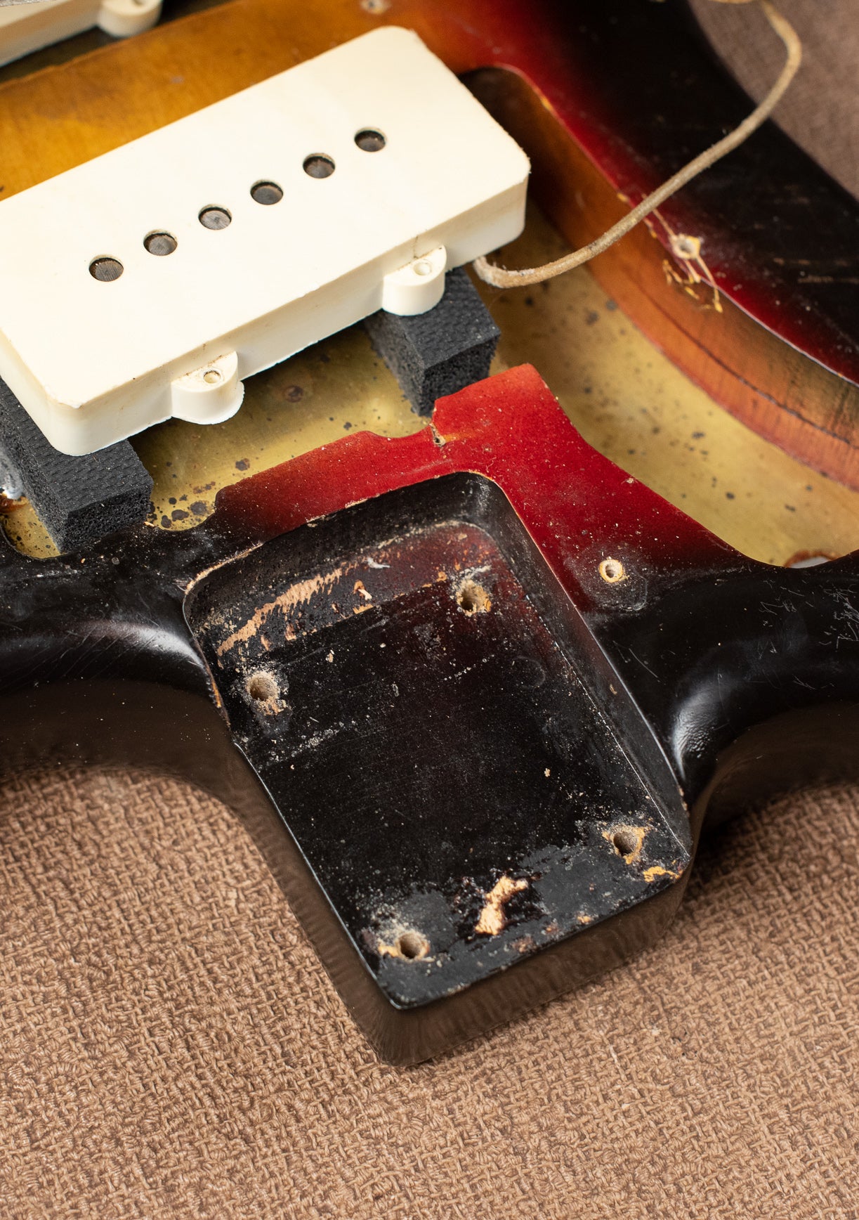 Neck pocket, nail hole, vintage 1963 Fender Jazzmaster electric guitar