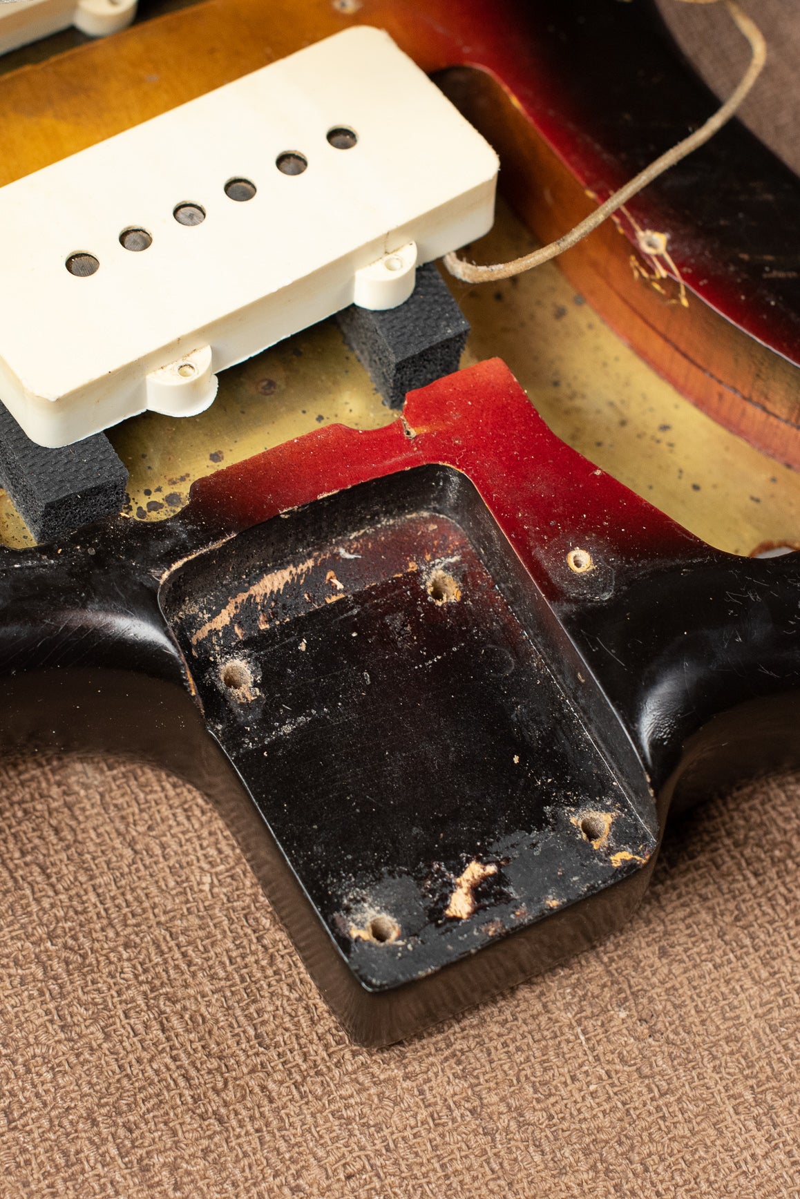 Neck pocket, nail hole, vintage 1963 Fender Jazzmaster electric guitar