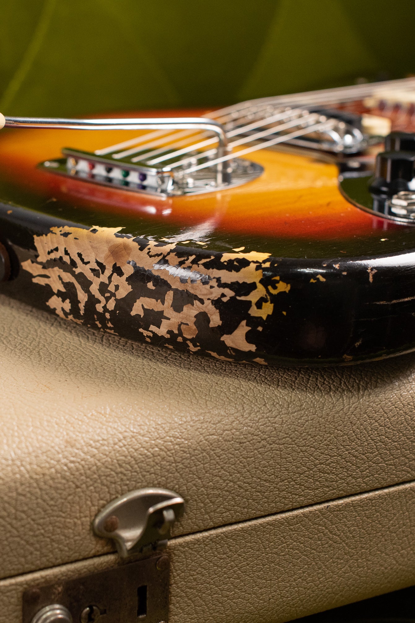 Finish flaking, Vintage 1963 Fender Jaguar Sunburst guitar