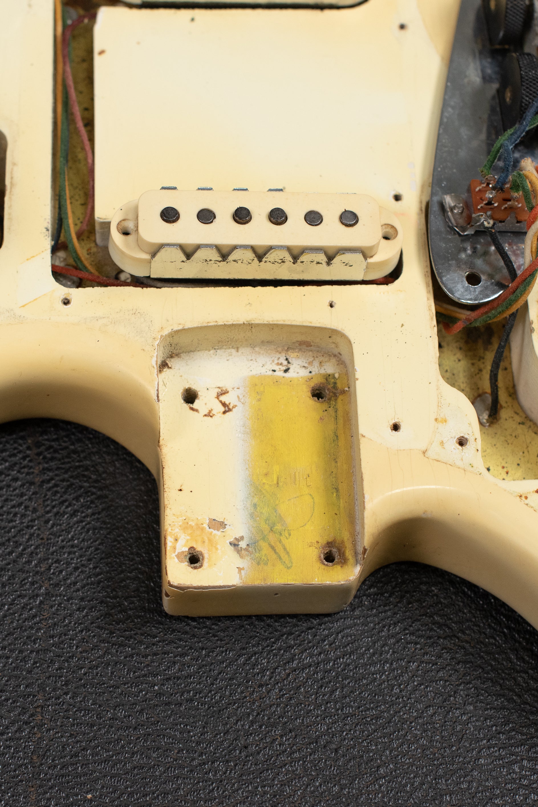 Neck pocket paint stick