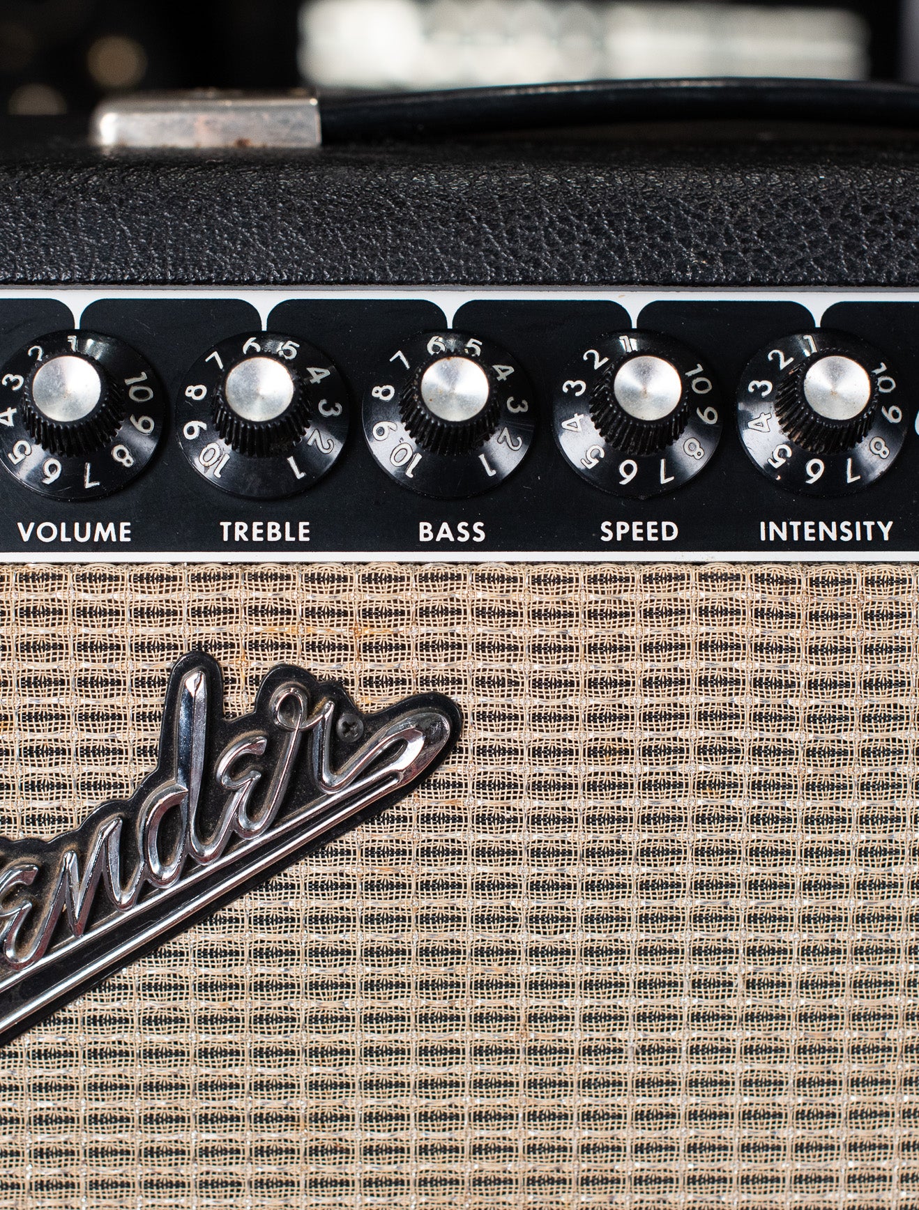 Fender guitar amplifier knobs, raised logo