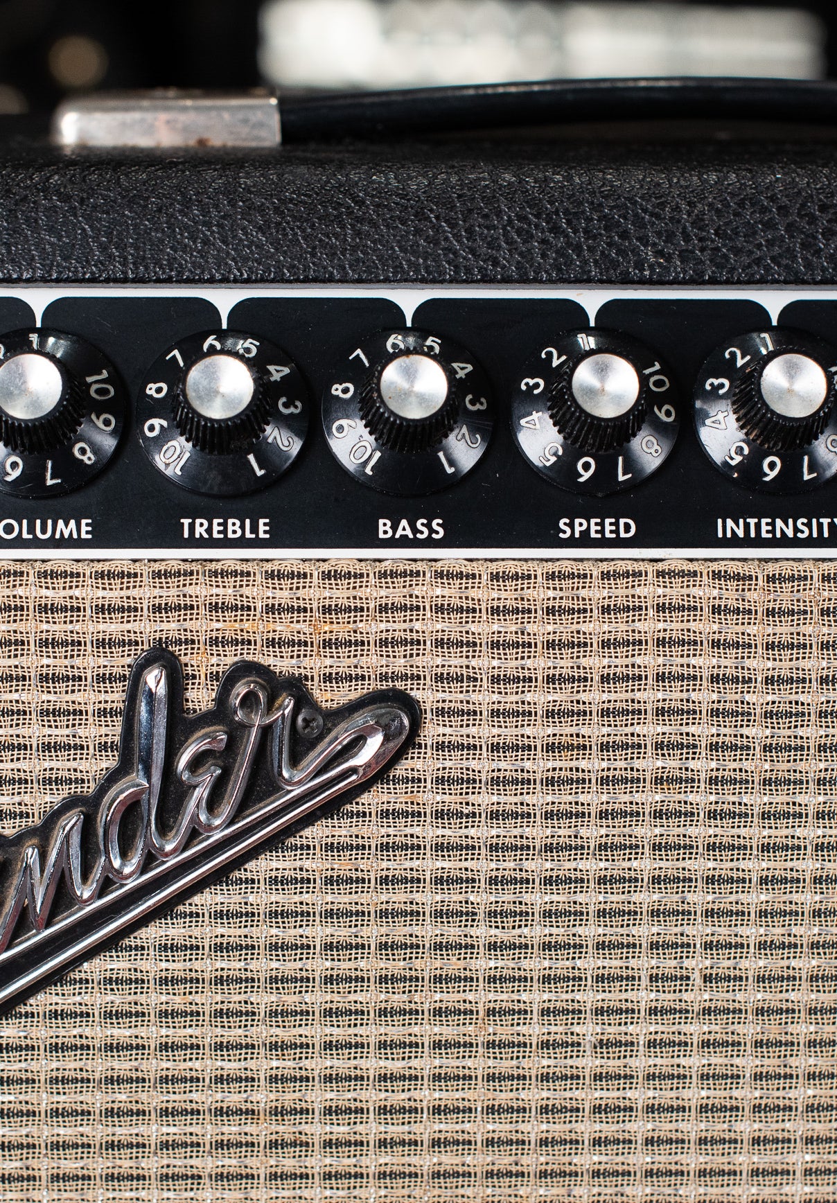 Fender guitar amplifier knobs, raised logo