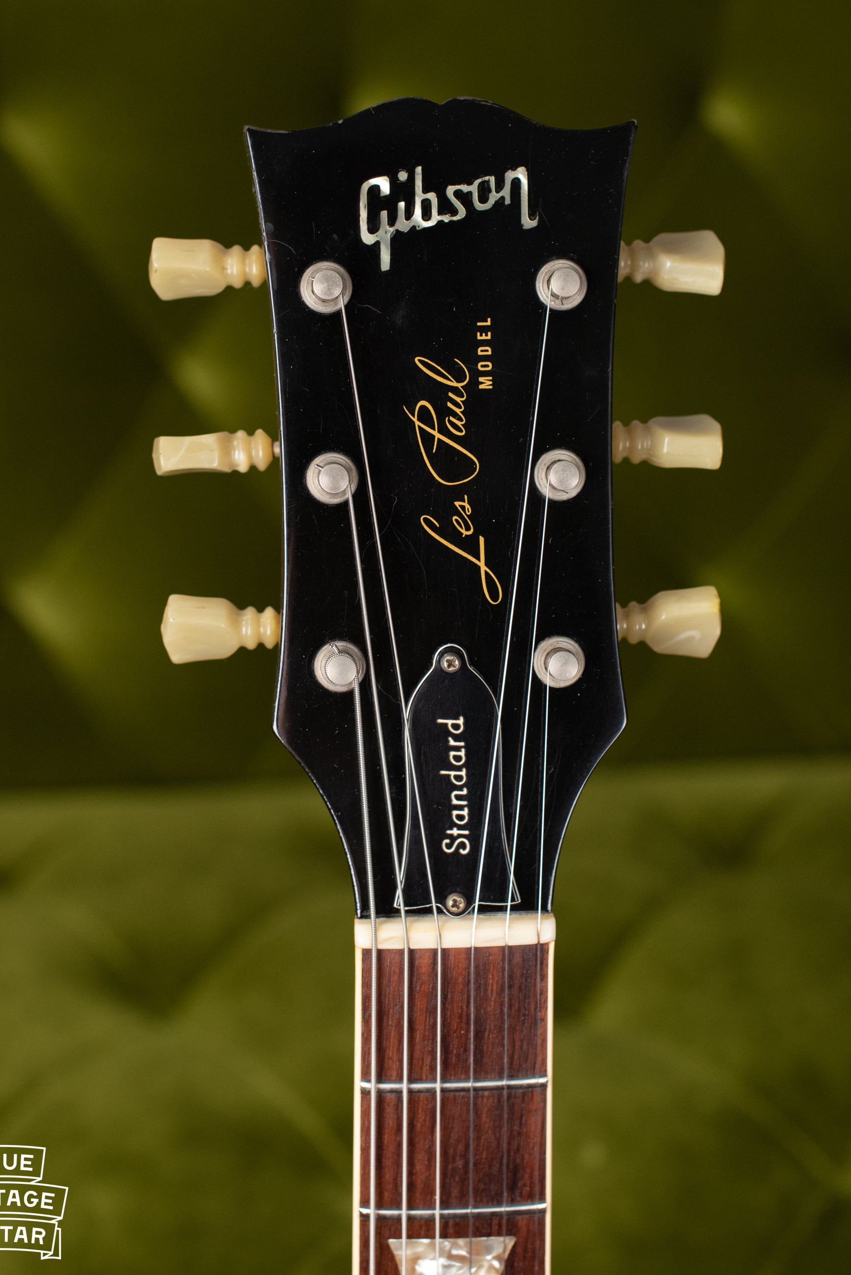 Headstock, small font Standard truss rod cover