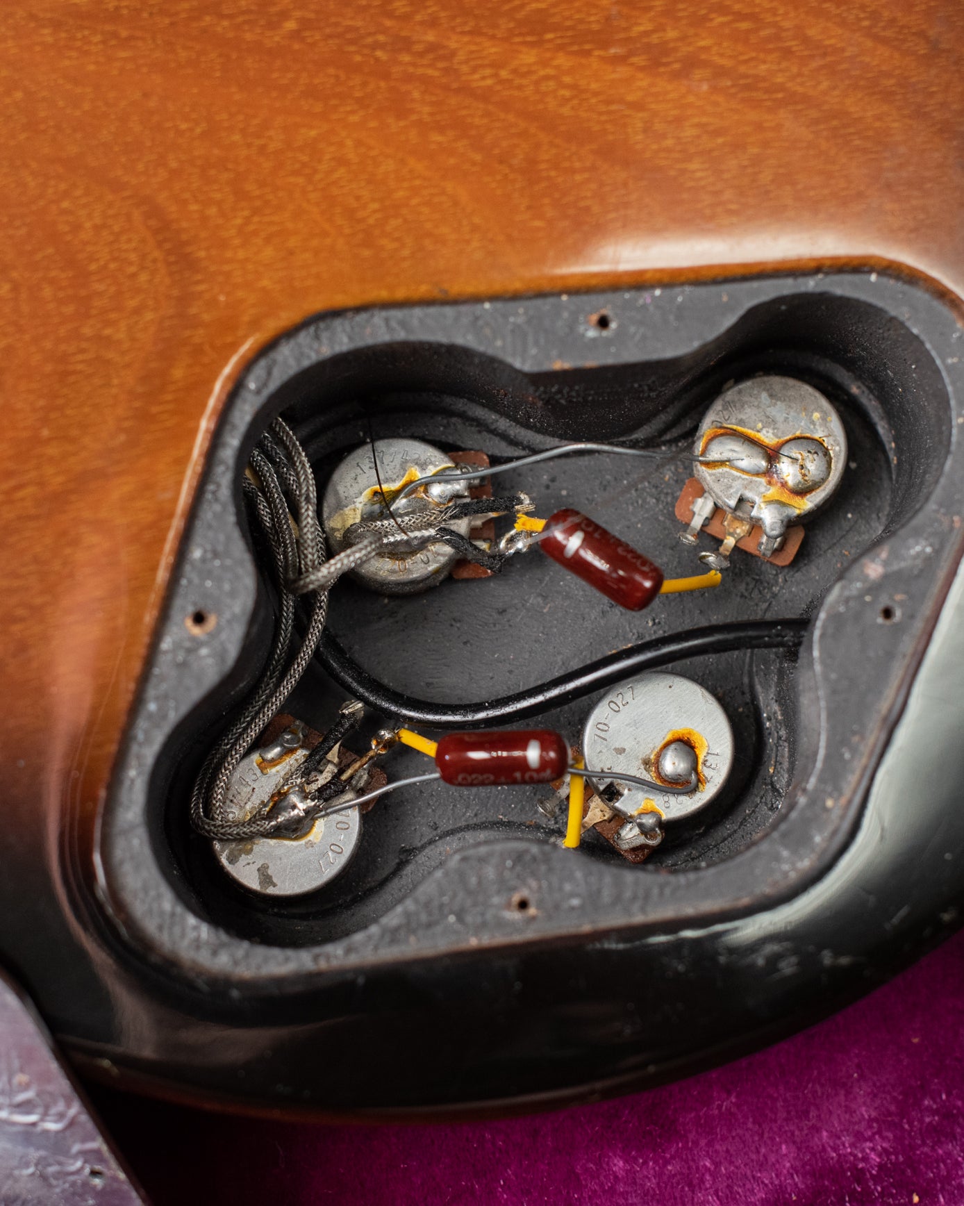 Potentiometers, capacitors, control cavity with shielding