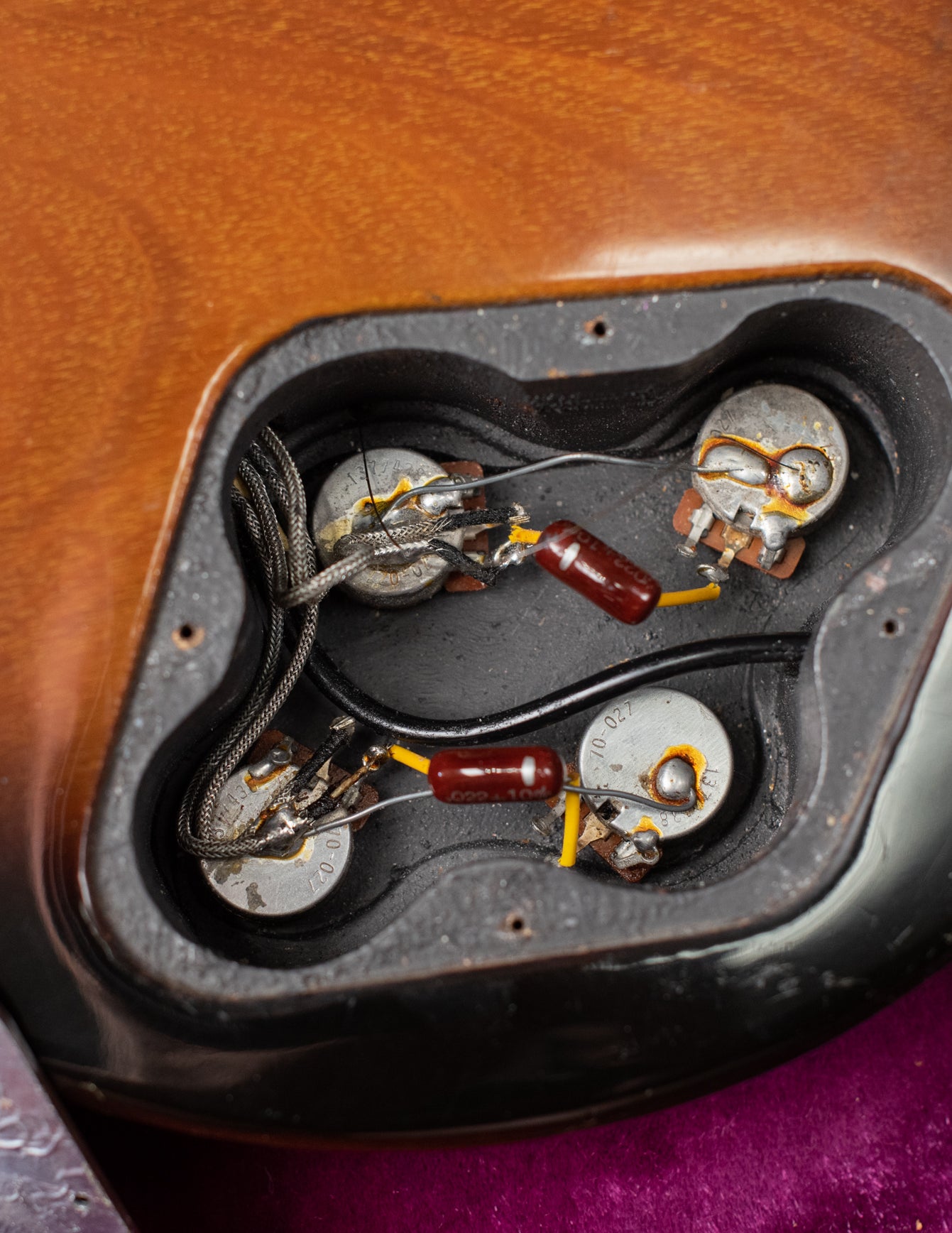 Potentiometers, capacitors, control cavity with shielding