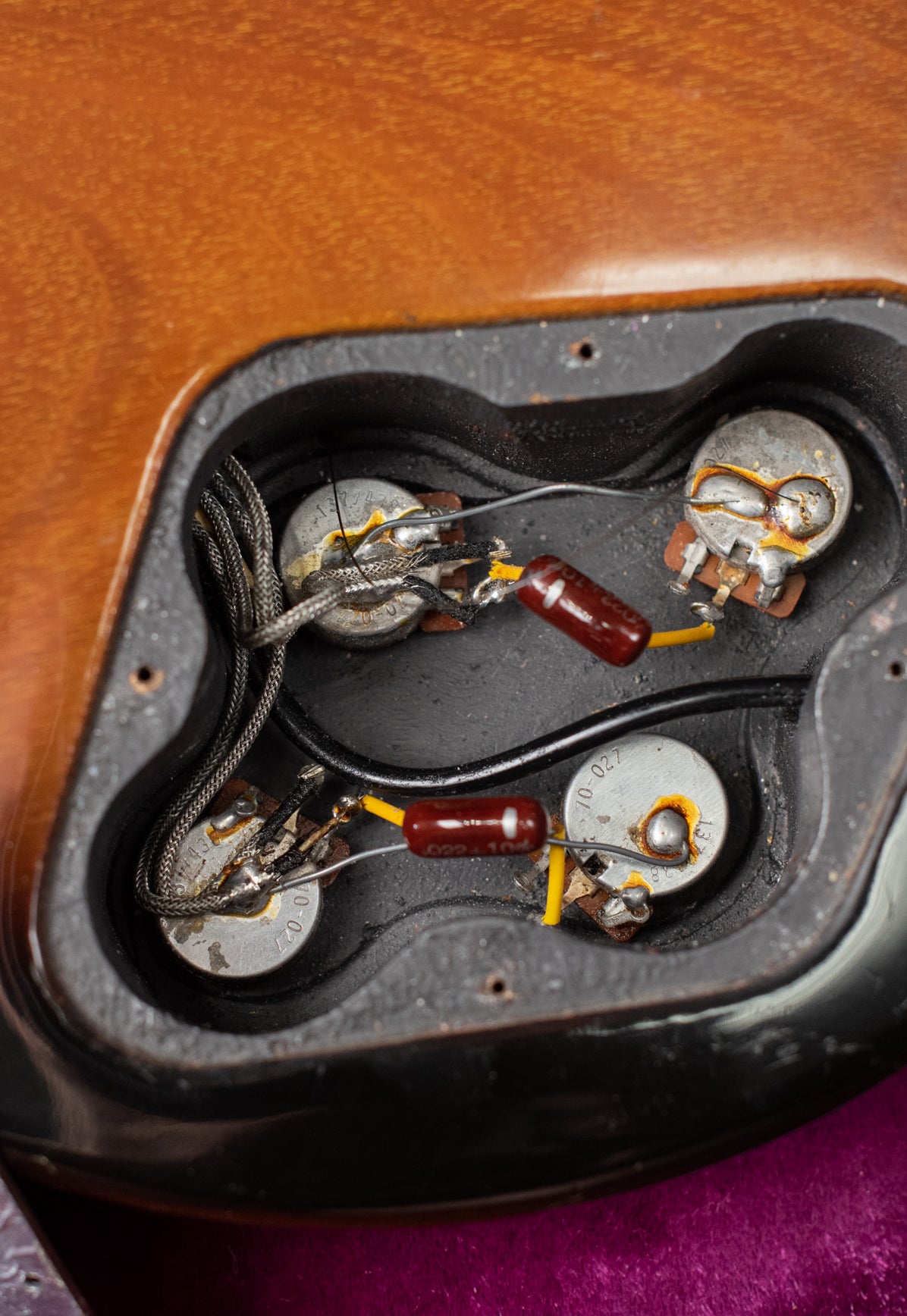 Potentiometers, capacitors, control cavity with shielding