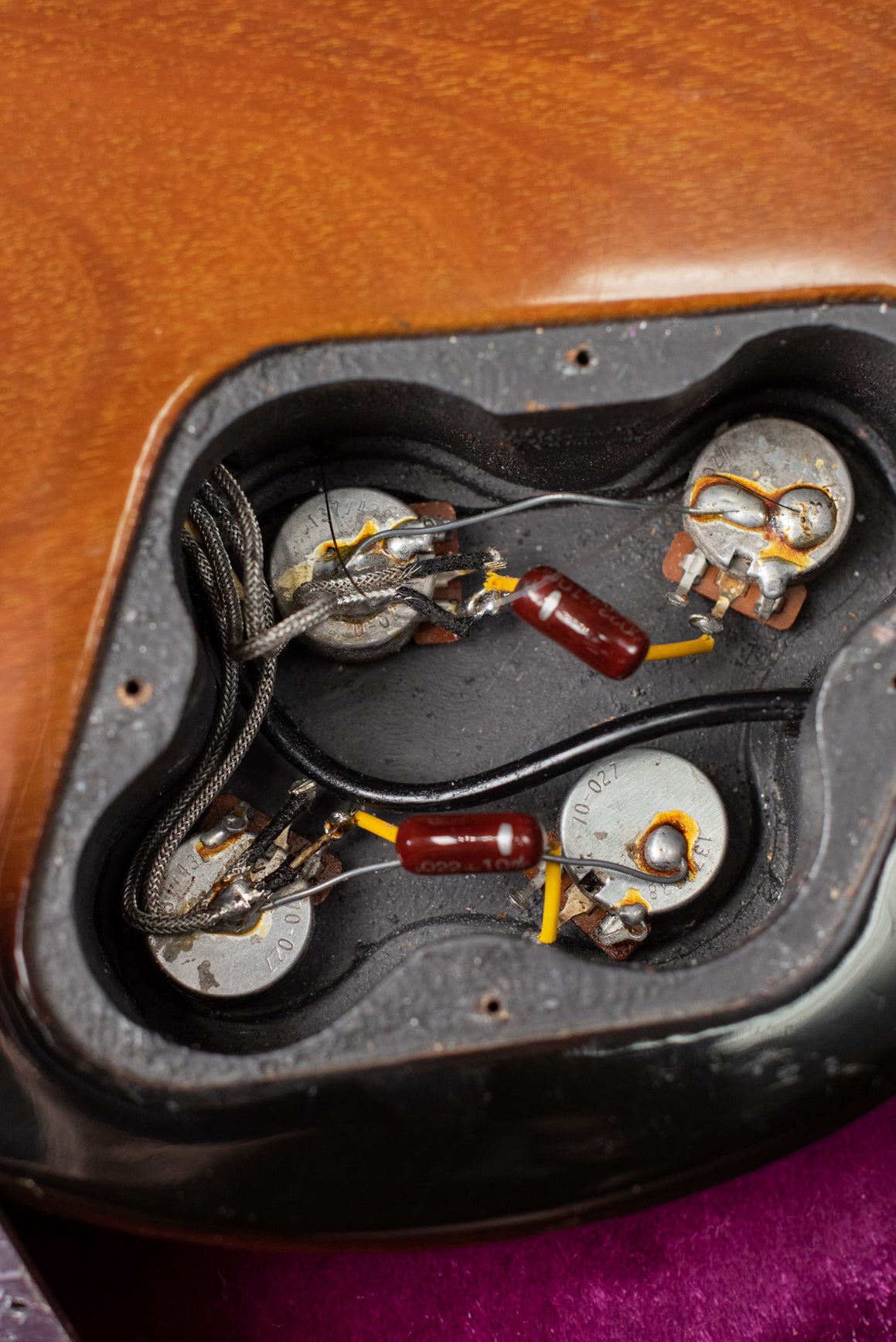 Potentiometers, capacitors, control cavity with shielding