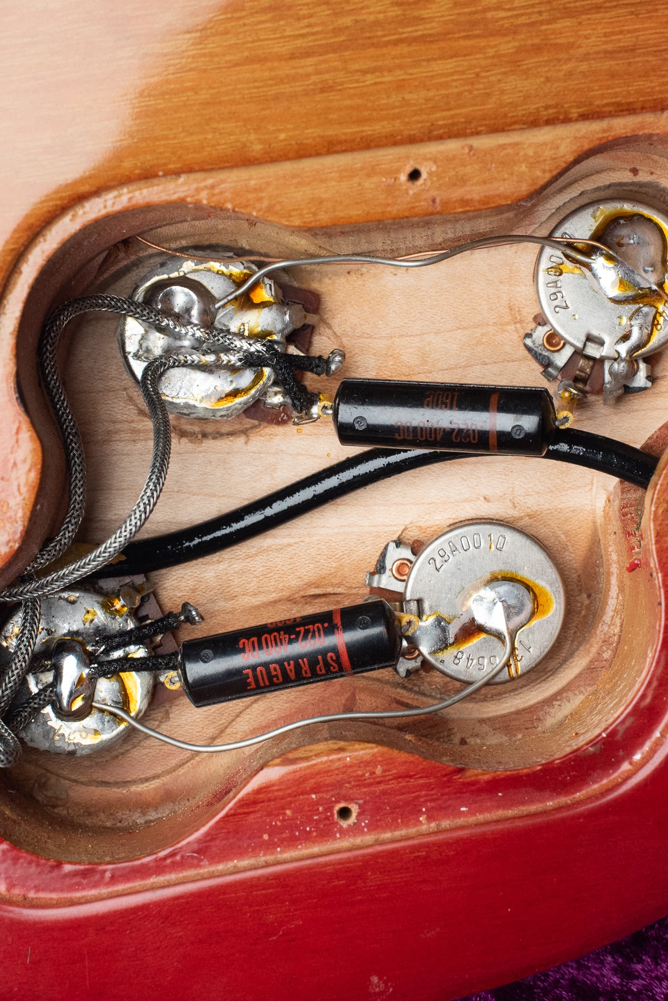 1970 Gibson Les Paul Deluxe, control cavity, black Sprague capacitors, potentiometers