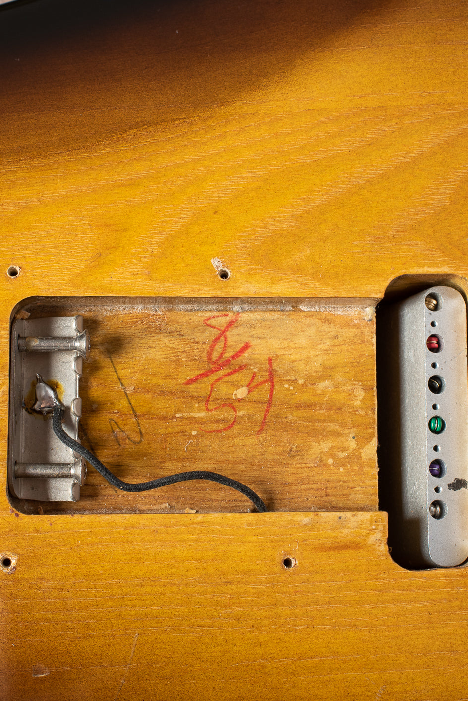 Fender Stratocaster 1954 tremolo cavity with "8/54/" red pencil signature