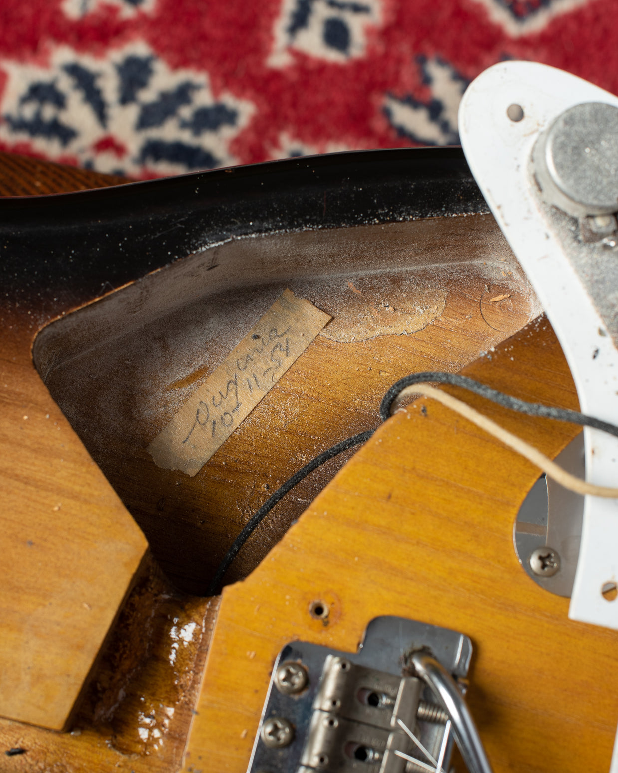 "Virginia 10-11-54" masking tape signature in control cavity of Fender Stratocaster 1954