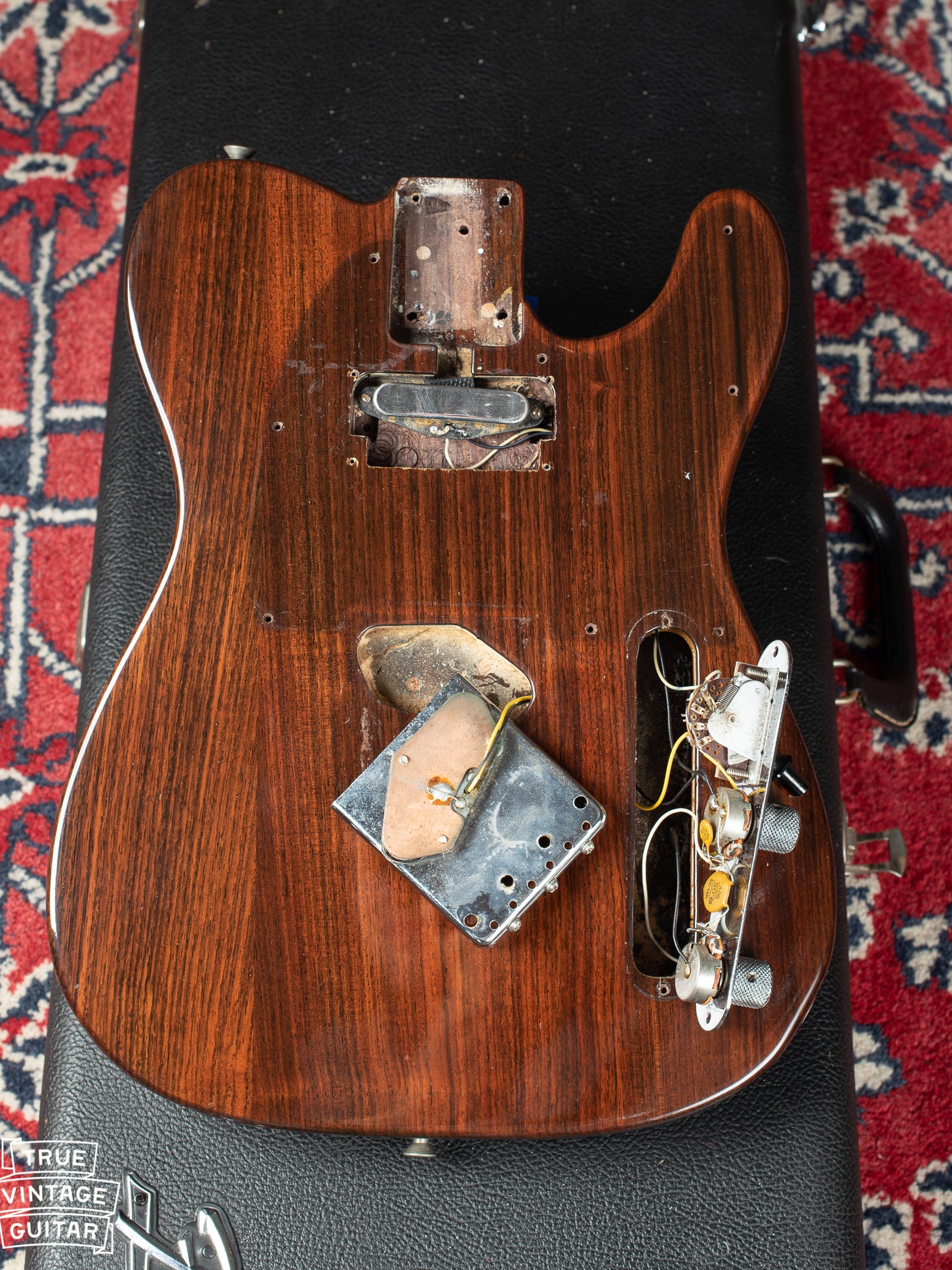 Fender Rosewood Telecaster 1971 with pickguard and bridge plate removed. The Neck pickup cavity is routed for a humbucking pickup.
