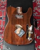 Fender Rosewood Telecaster 1971 with pickguard and bridge plate removed. The Neck pickup cavity is routed for a humbucking pickup.
