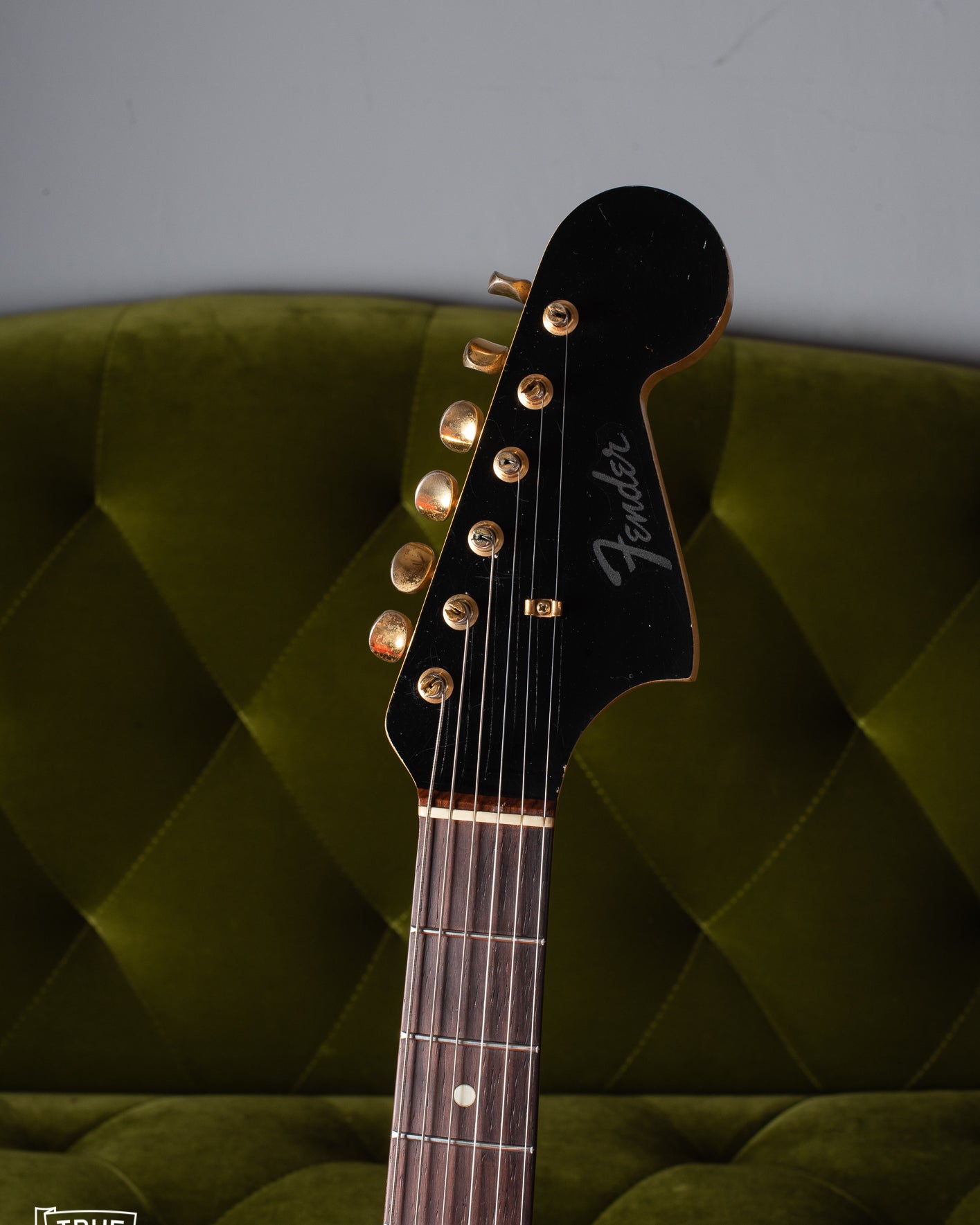 black matching headstock with clipped Fender logo