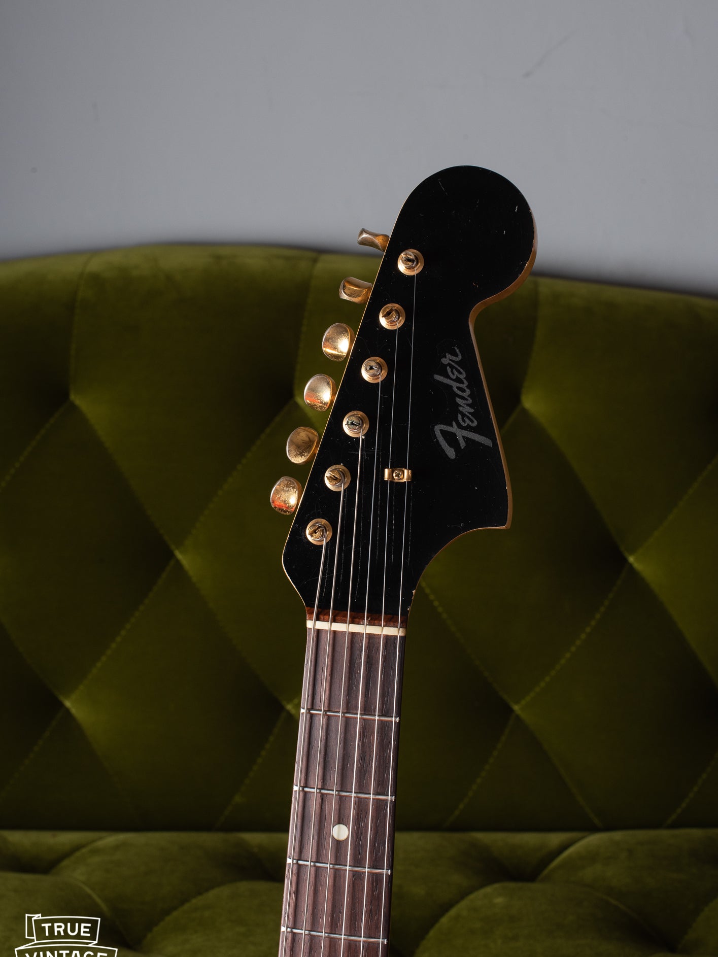 black matching headstock with clipped Fender logo