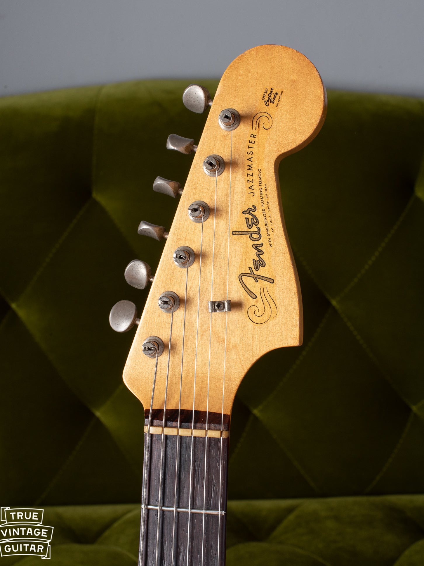 Fender Jazzmaster headstock with slab fretboard, spaghetti style logo