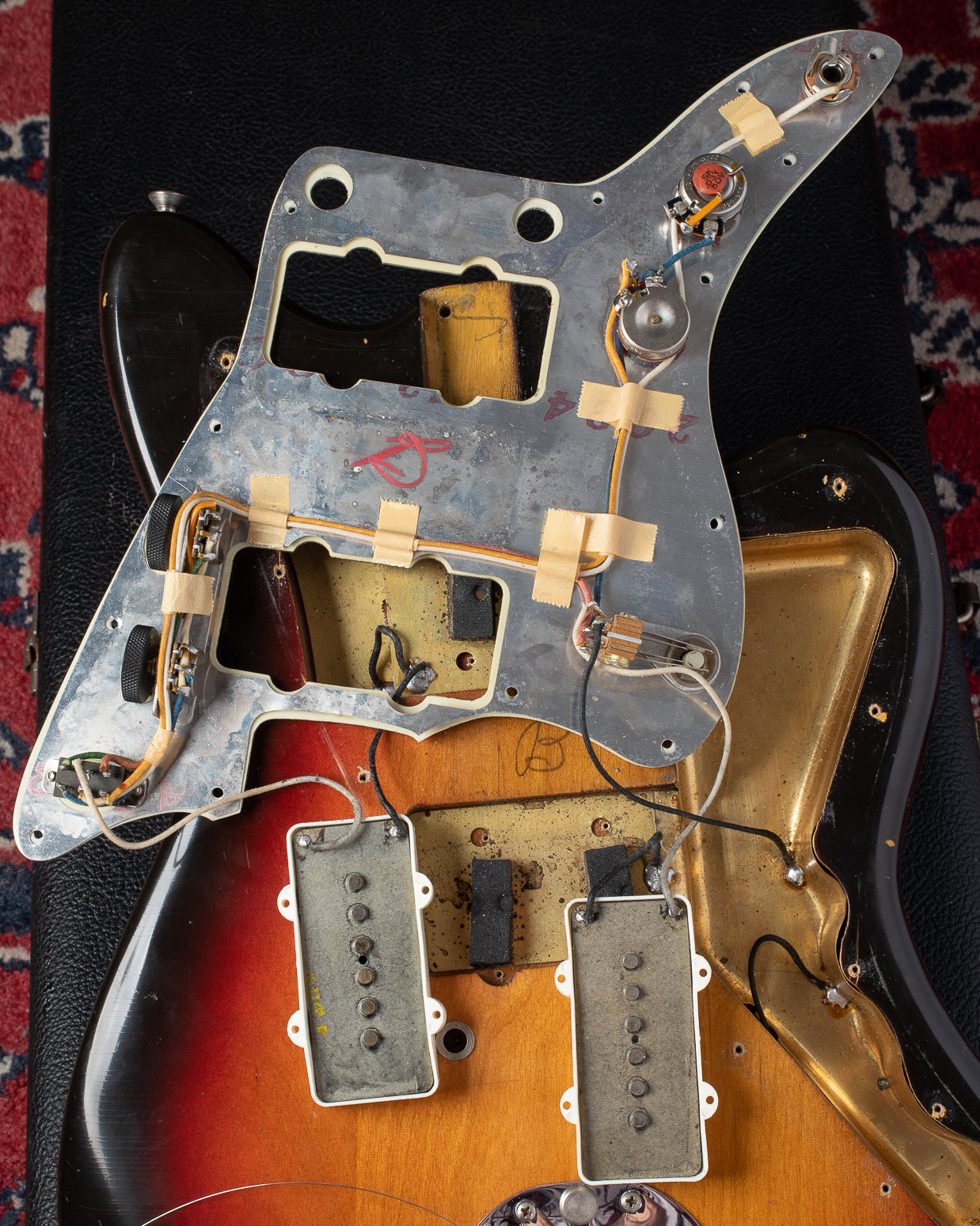 Original electronics under pickguard of 1964 Fender Jazzmaster