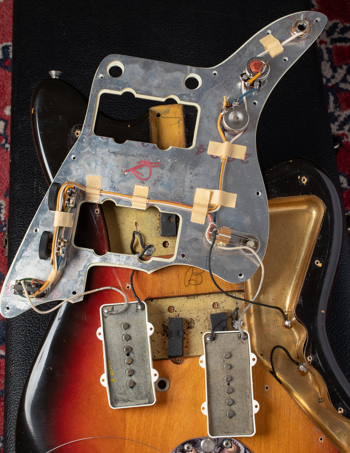 Original electronics under pickguard of 1964 Fender Jazzmaster