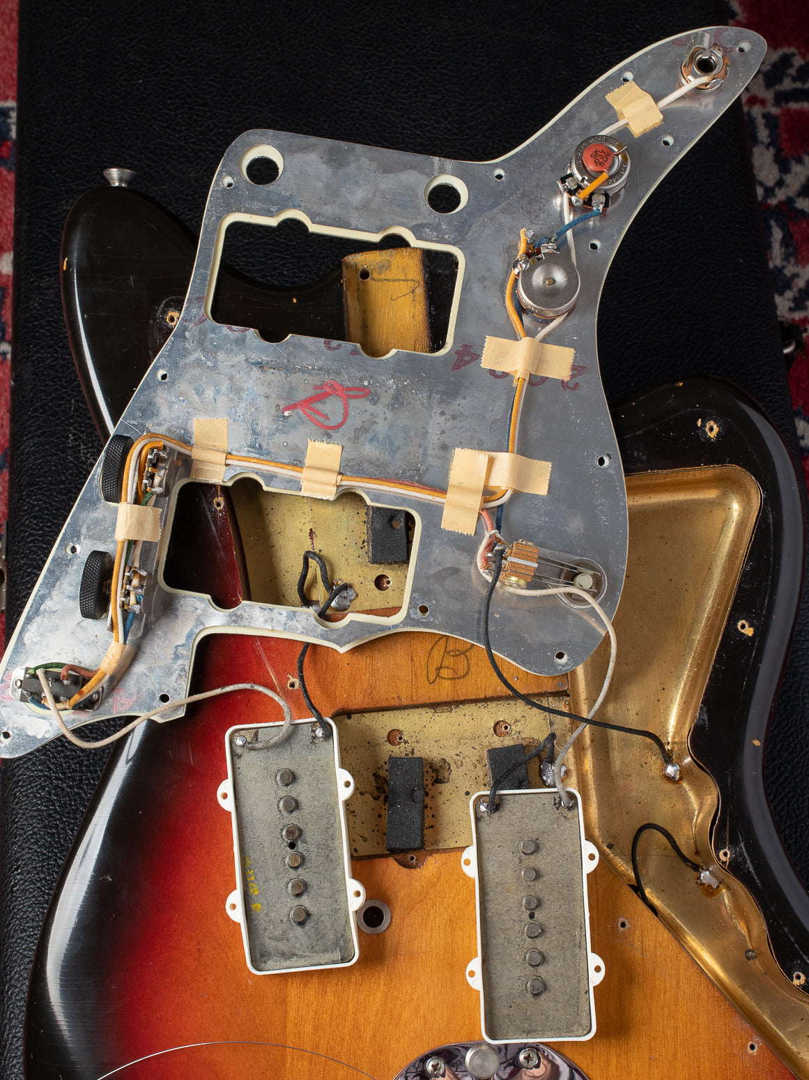 Original electronics under pickguard of 1964 Fender Jazzmaster