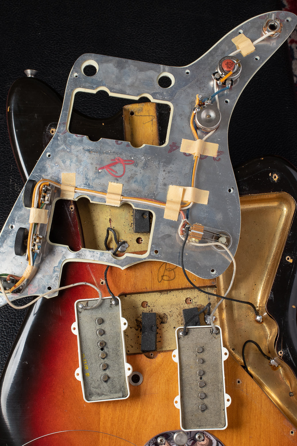 Original electronics under pickguard of 1964 Fender Jazzmaster
