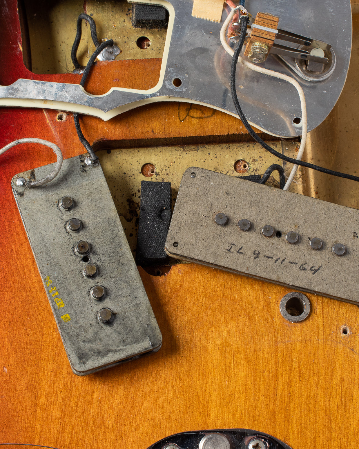 Grey bobbin pickups with dates on 1964 Fender Jazzmaster