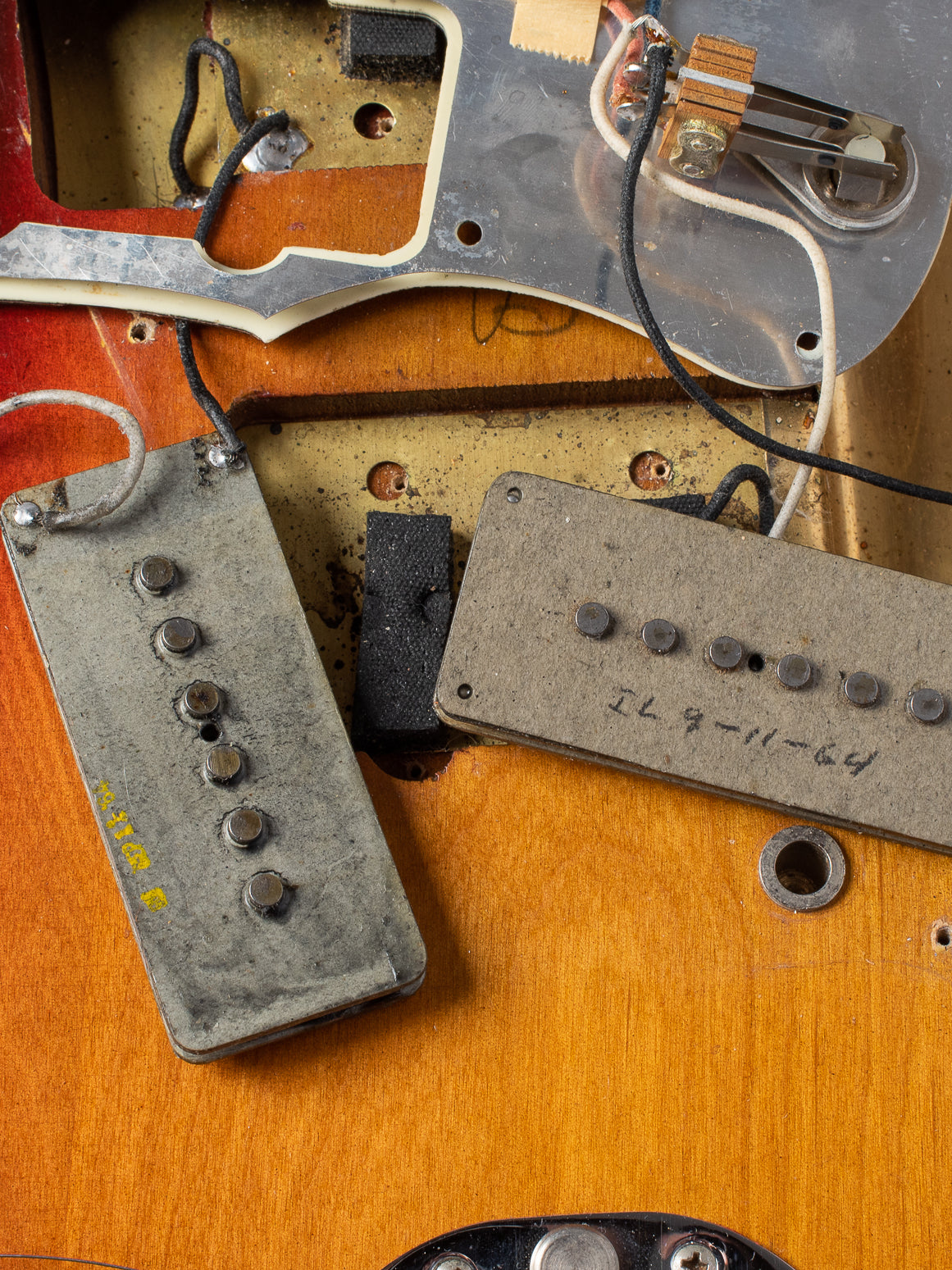 Grey bobbin pickups with dates on 1964 Fender Jazzmaster