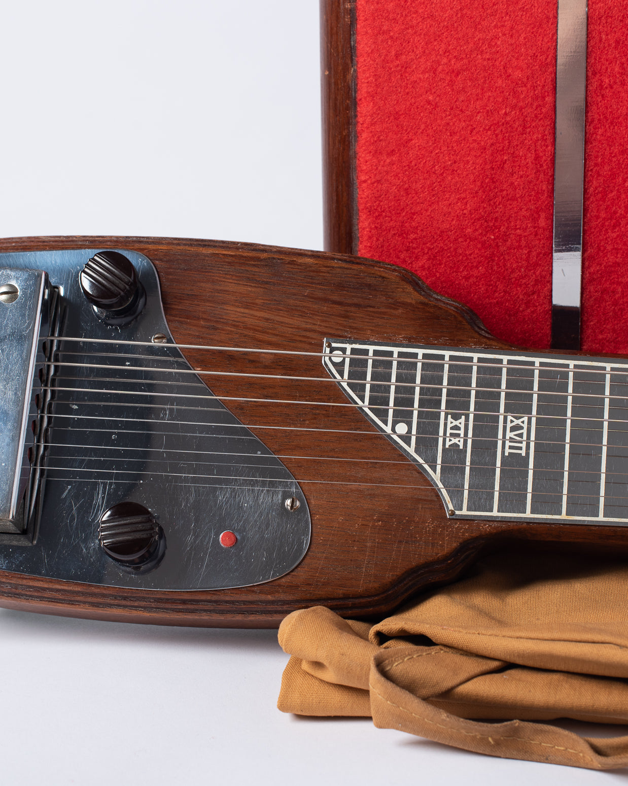 Red button on Fender lap steel guitar organ button