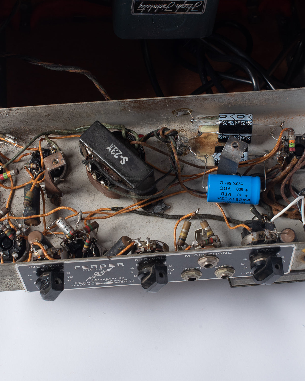 Output transformer and circuit inside chassis of 1946 Fender Model 26 Deluxe amp woody