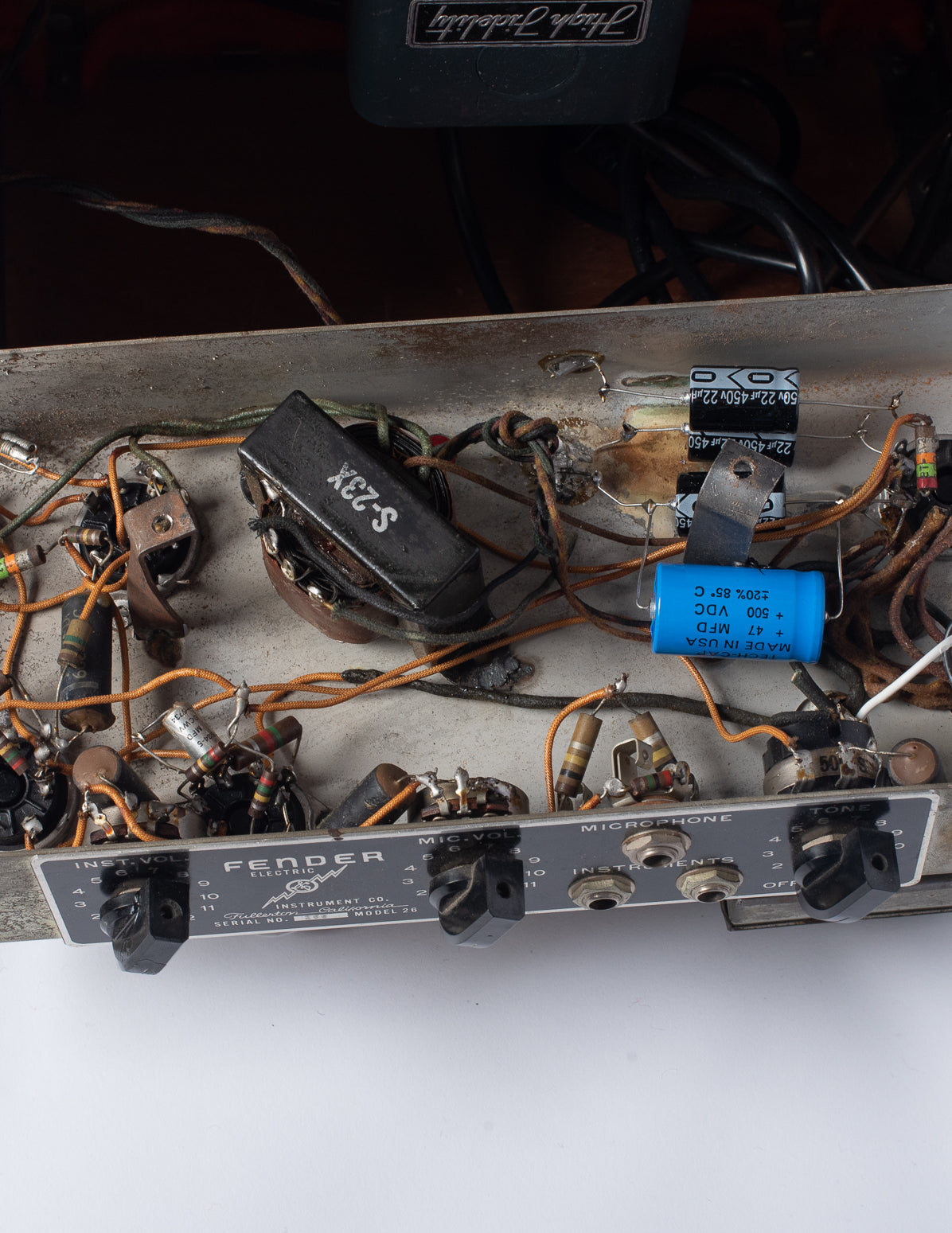 Output transformer and circuit inside chassis of 1946 Fender Model 26 Deluxe amp woody