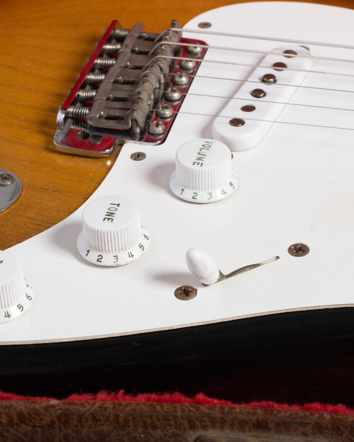 Short skirt knobs and football shaped switch tip on 1954 Fender Stratocaster