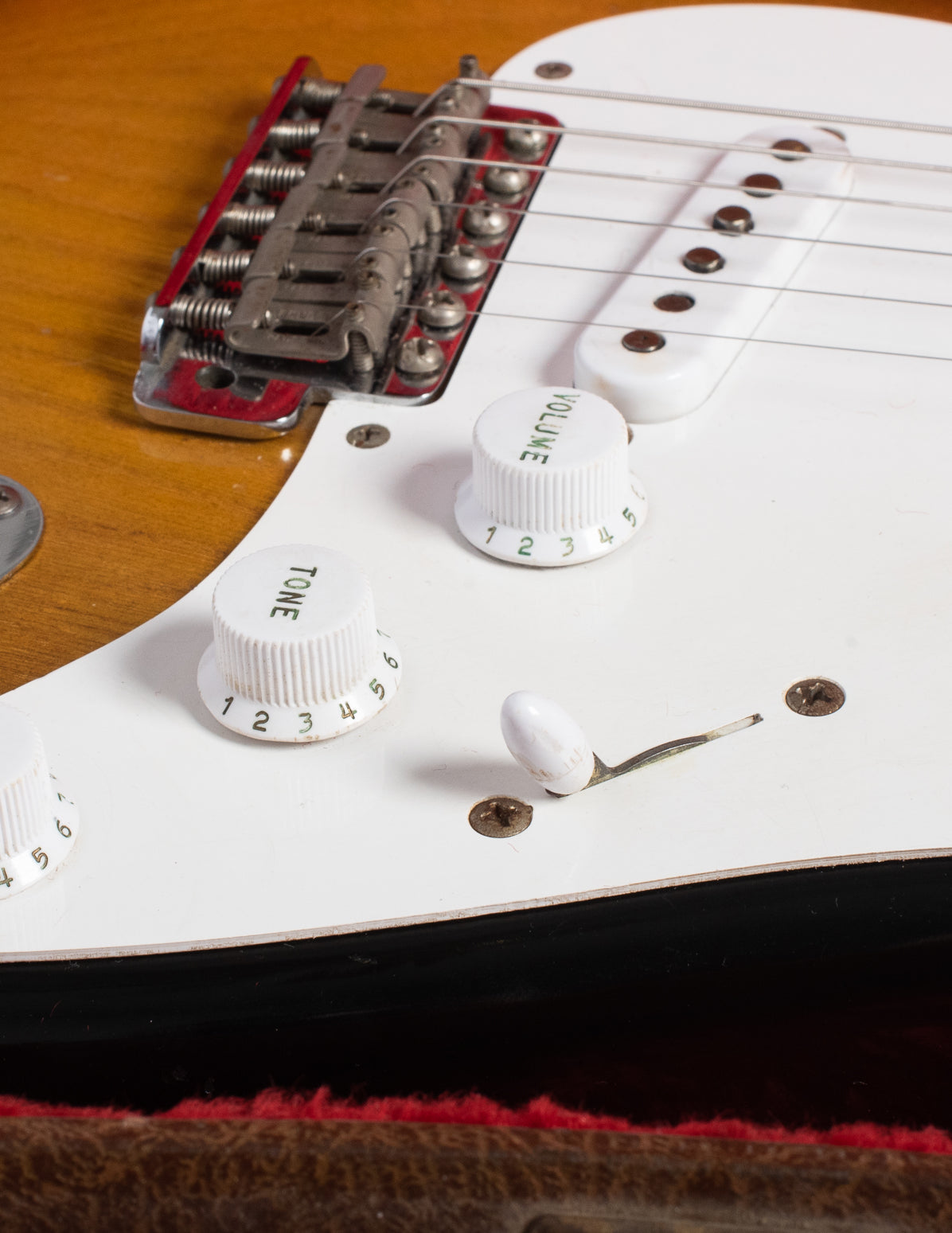 Short skirt knobs and football shaped switch tip on 1954 Fender Stratocaster