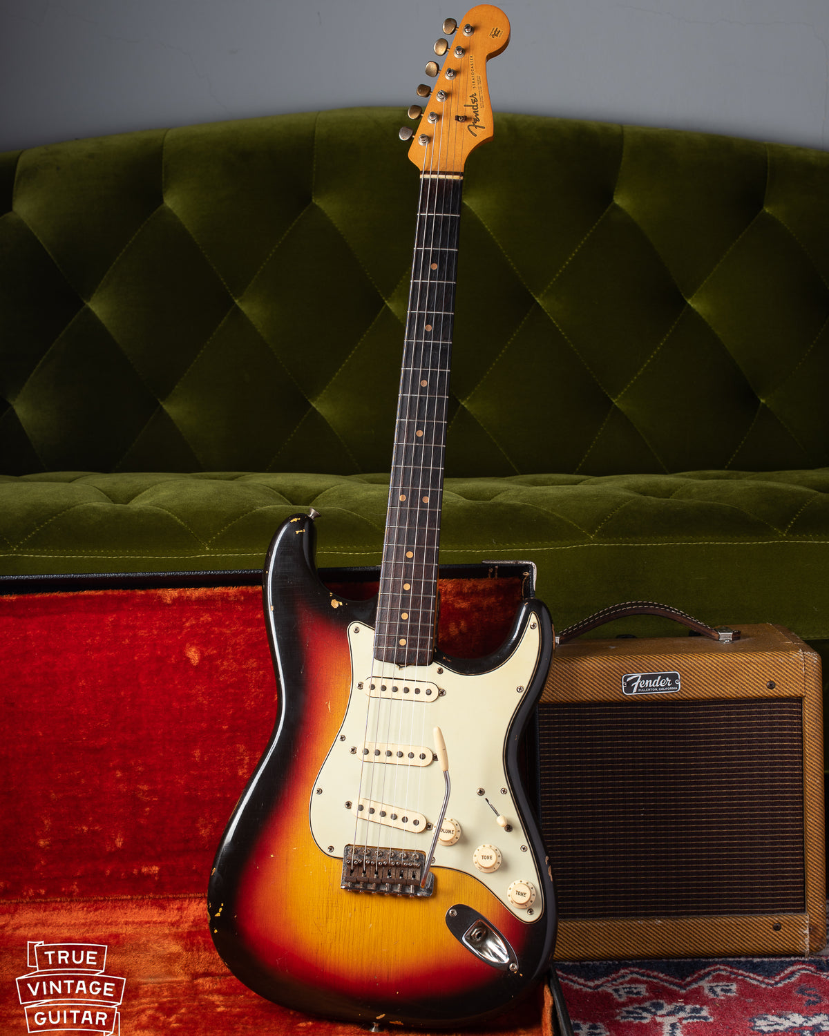 1963 Fender Stratocaster with Sunburst finish, mint green pickguard